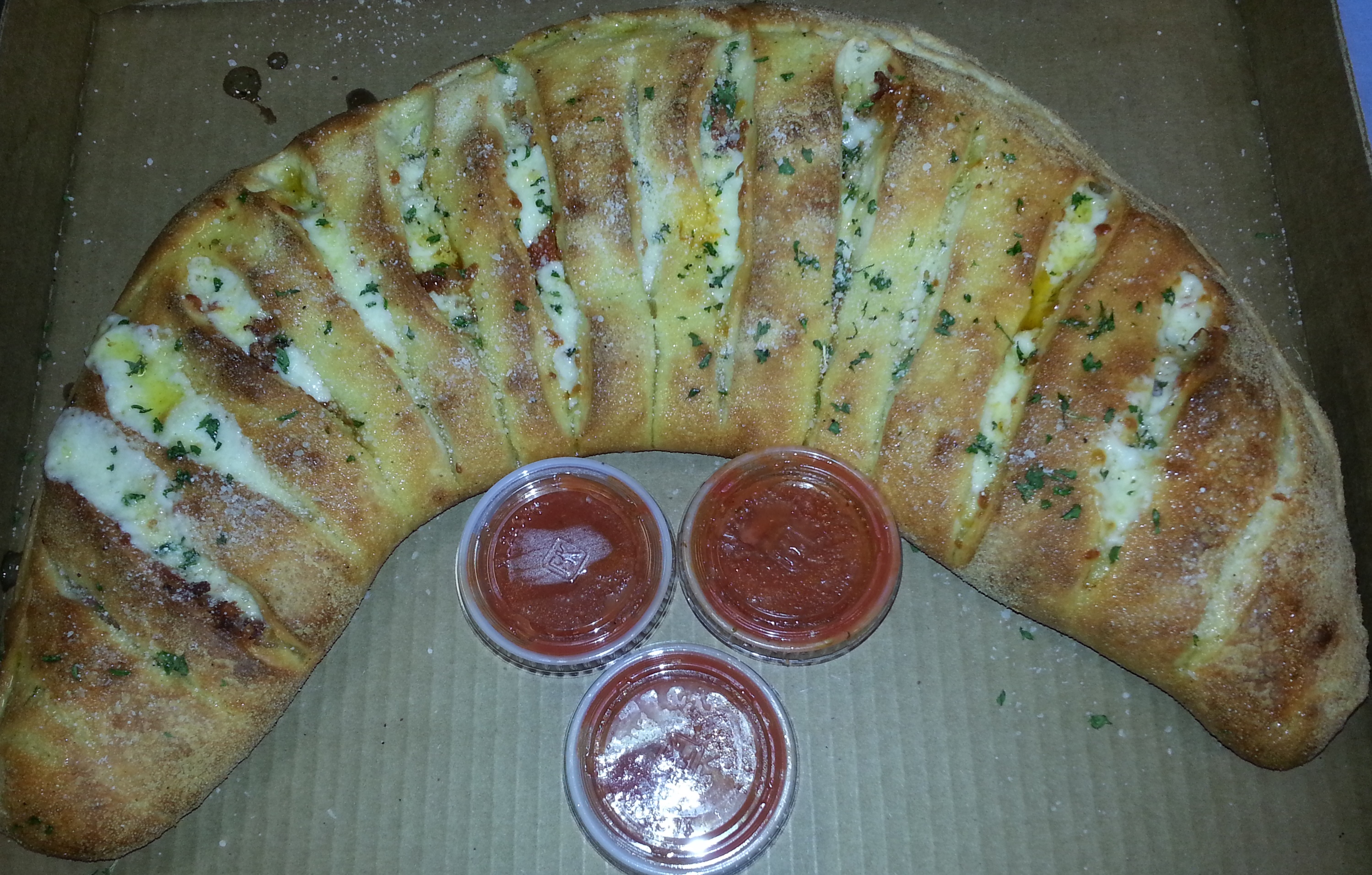 Order Veggie Deluxe Calzone food online from Papa Ray's Pizza store, Daly City on bringmethat.com