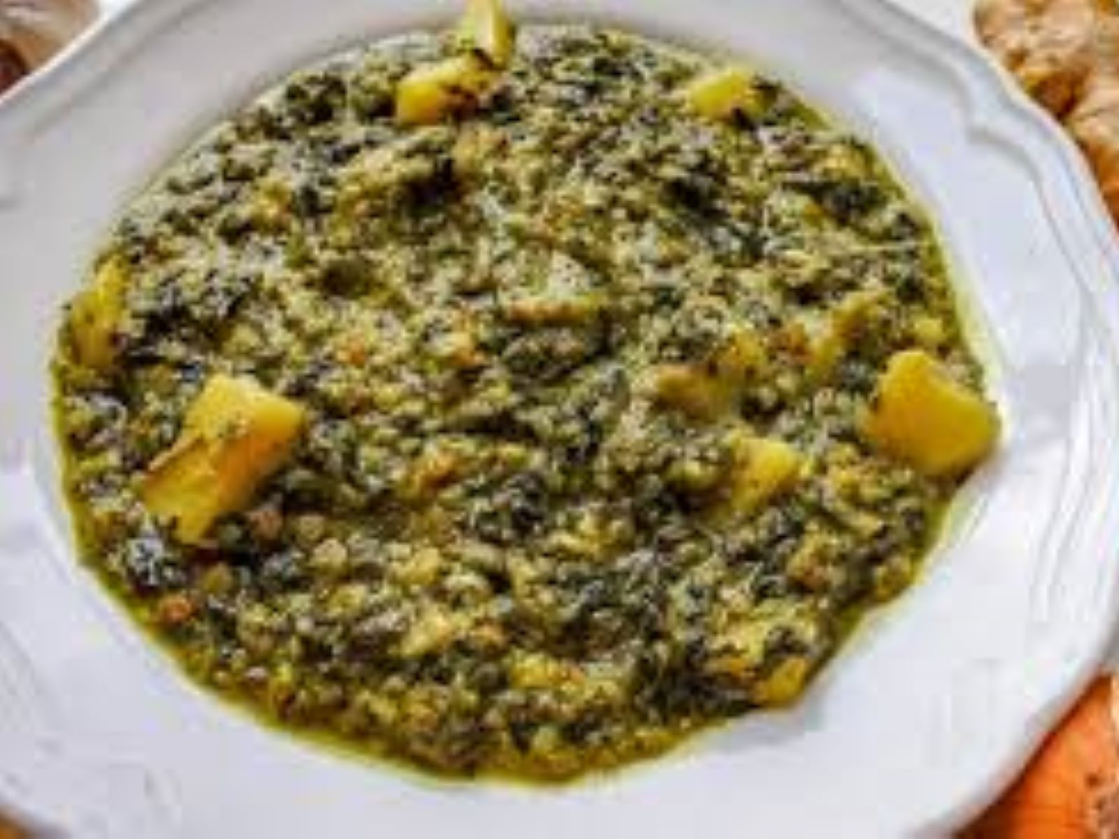 Order Aloo Palak food online from Passage to India store, Cambridge on bringmethat.com