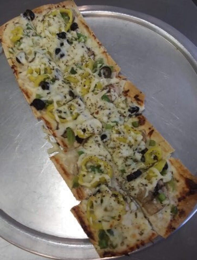 Order Veggie Flat Bread Pie - Pizza food online from Italian Pie & Bakery store, Waveland on bringmethat.com