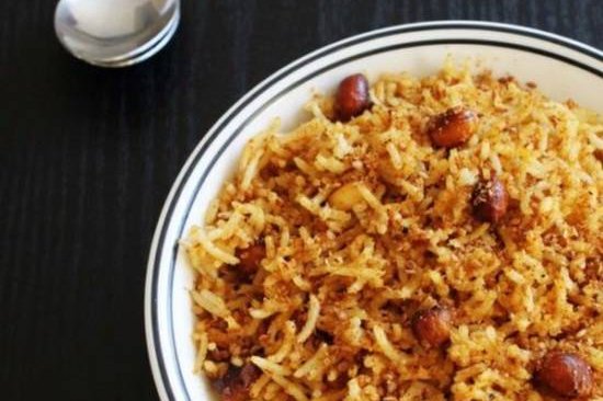 Order Tamarind Rice food online from Madras Cafe store, San Diego on bringmethat.com