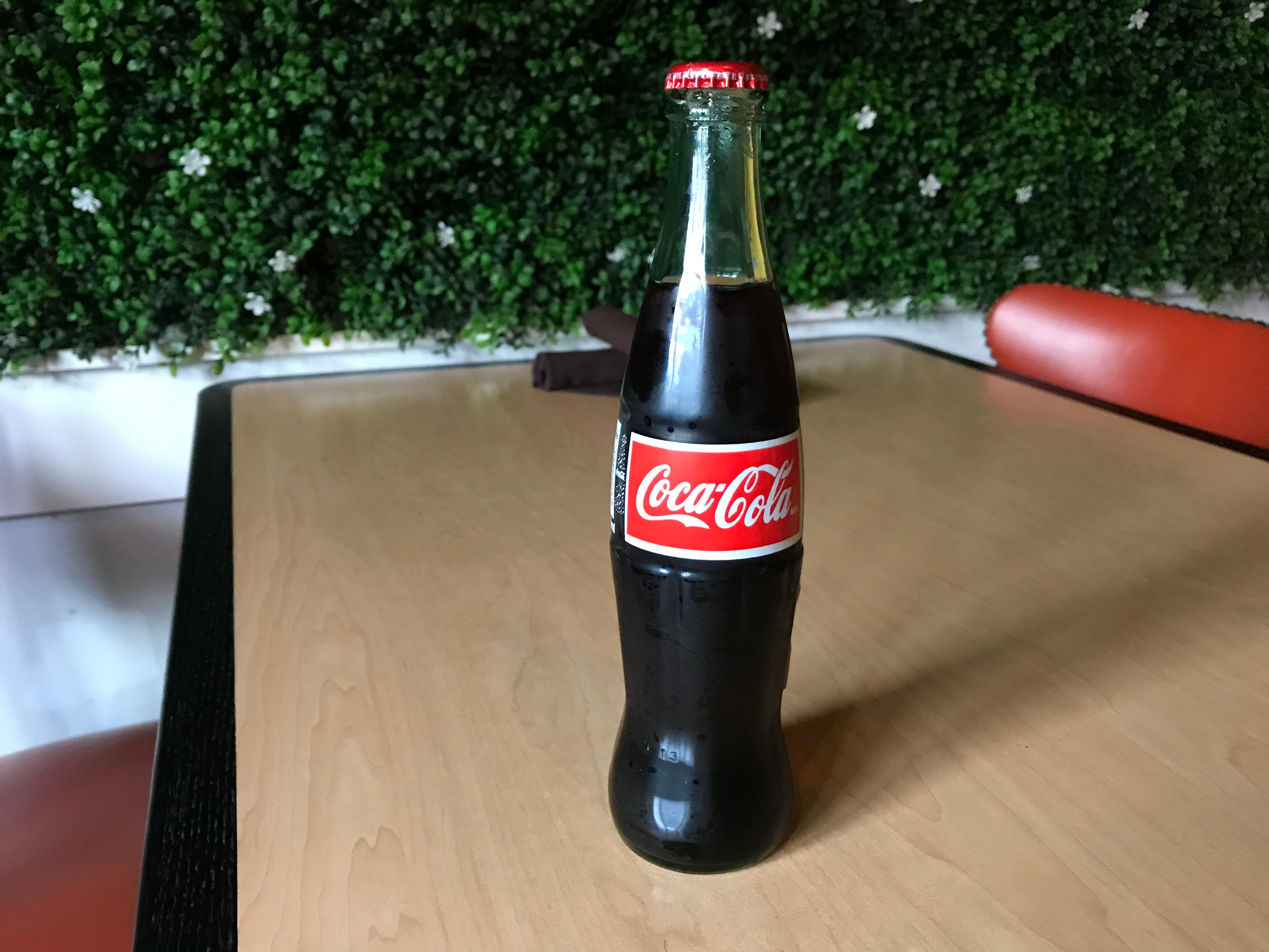 Order Mexican Coke food online from Totopo Mexican Kitchen And Bar store, Pittsburgh on bringmethat.com
