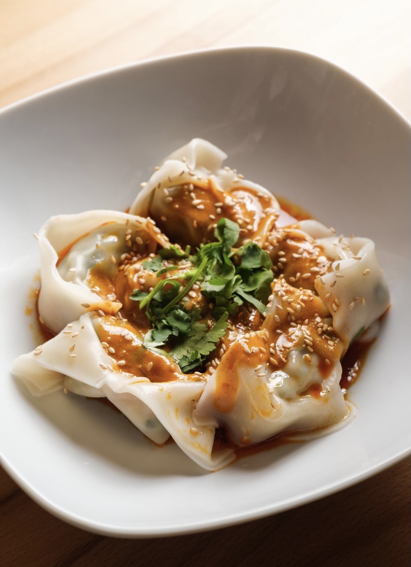 Order Wonton in Red Chili Sauce - 6 pcs food online from The Bund store, Forest Hills on bringmethat.com