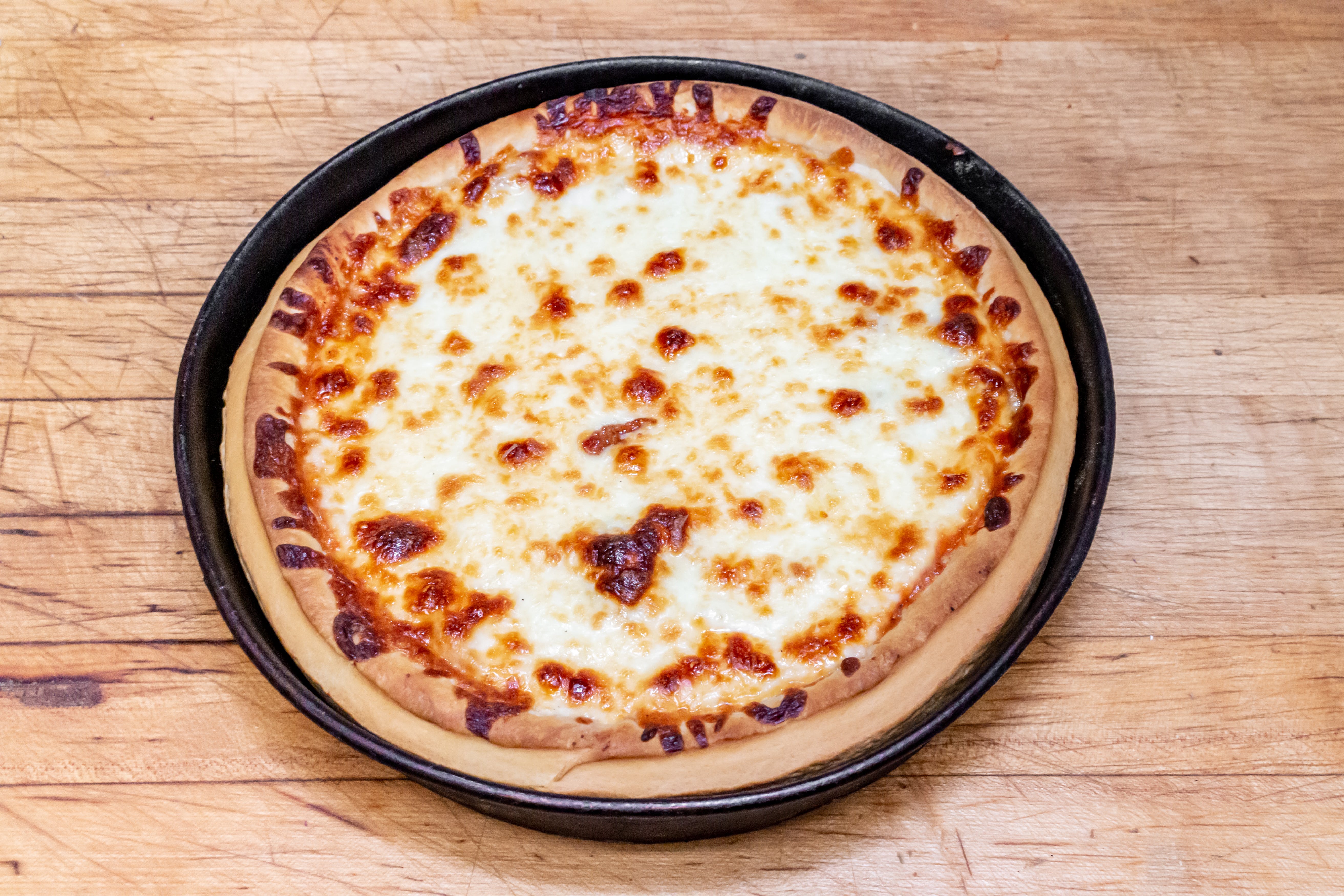 Order Stuffed Cheese Pizza - Small 12'' food online from Nick & Bruno Pizzeria store, Franklin Park on bringmethat.com