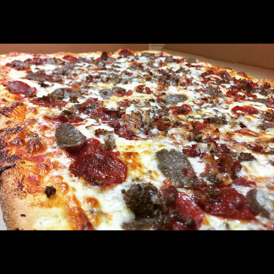 Order Meat Lovers Specialty Pizza food online from Husky Pizza store, Coventry on bringmethat.com