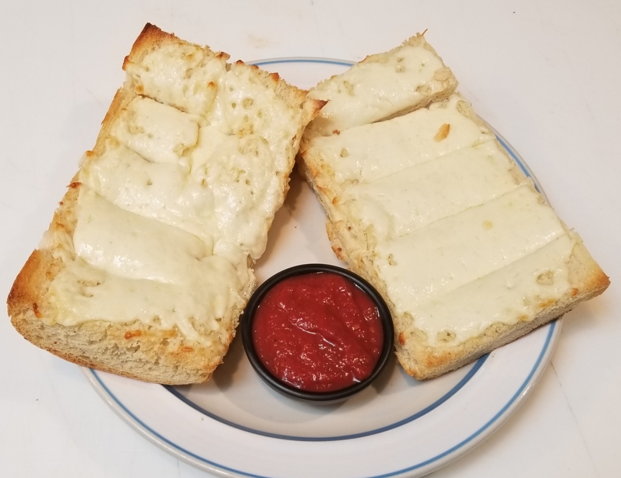 Order Garlic Bread with Cheese food online from Hayes Pizza store, San Francisco on bringmethat.com