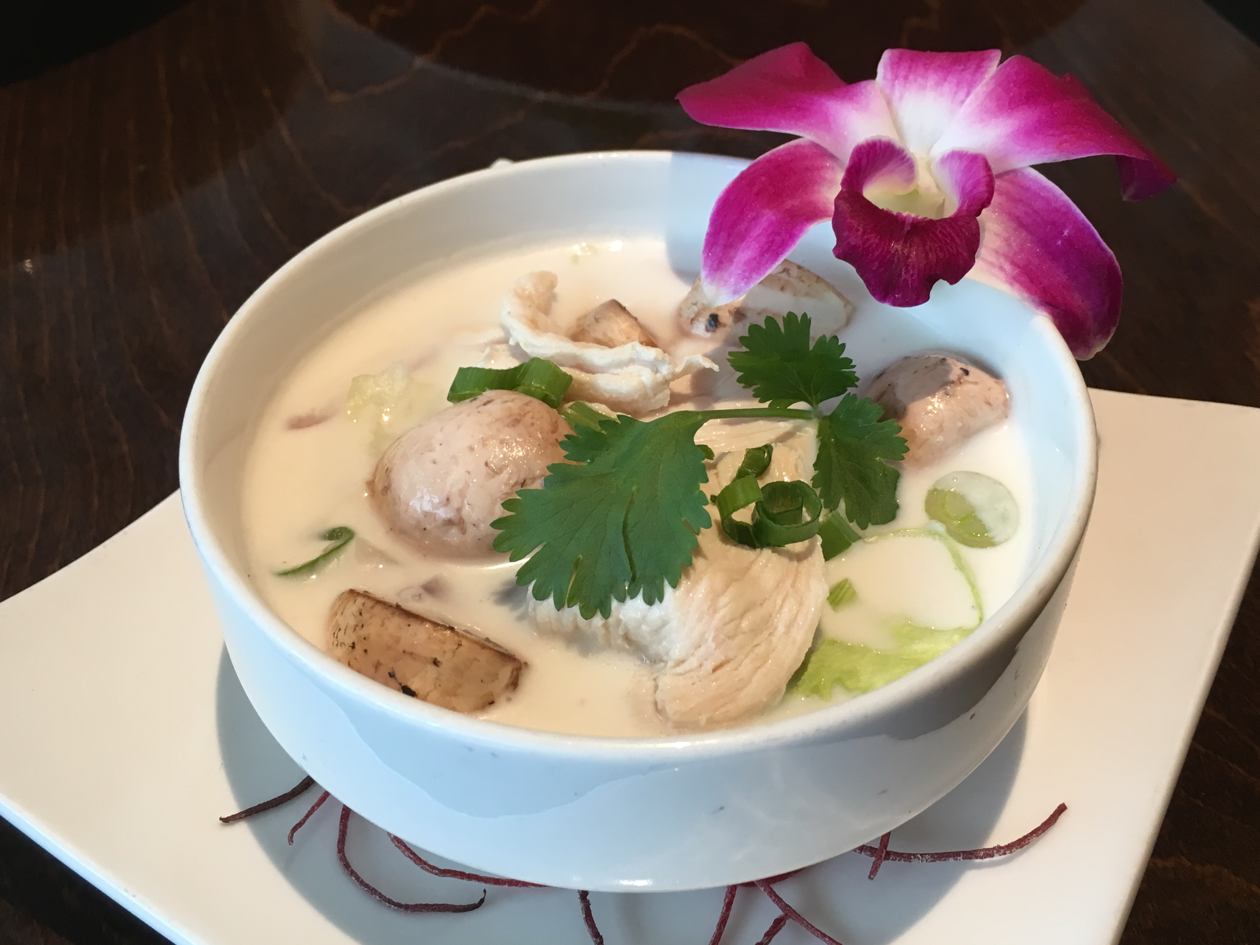 Order Tom Kha Soup food online from One Waan Thai store, San Francisco on bringmethat.com