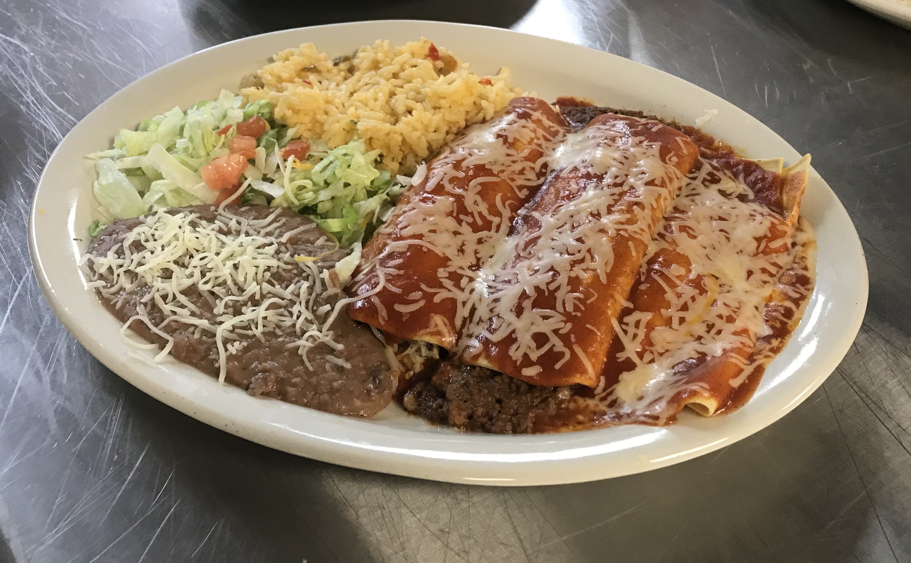 Order 3 Enchilada Dinner food online from Tumbleweed Southwest Grill store, Louisville on bringmethat.com