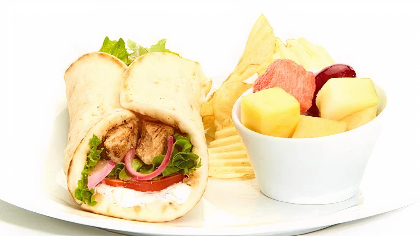 Order Grilled Chicken Gyro food online from Taziki Cafe store, Tuscaloosa on bringmethat.com