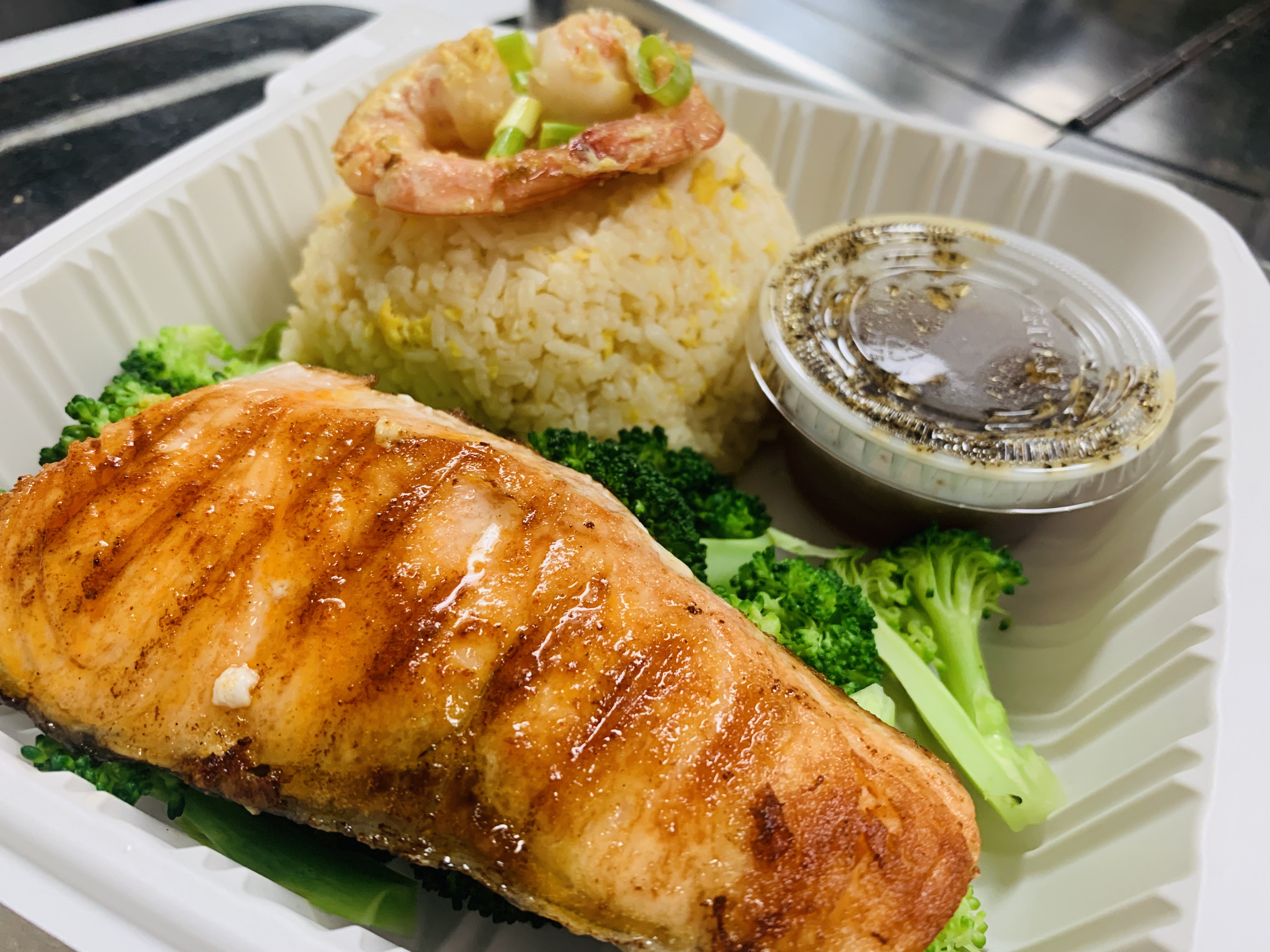 Order A1. Garlic Salmon Dinner Special food online from Shine Thai Cuisine store, Daly City on bringmethat.com