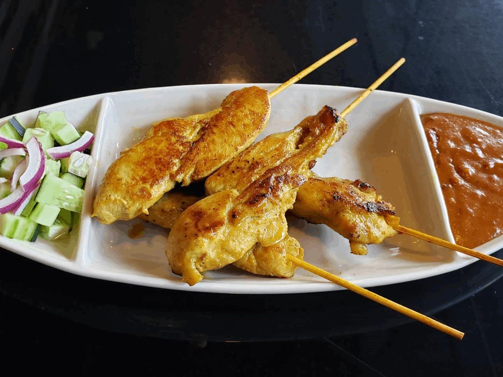 Order Chicken Satay food online from Thai Thani Kitchen store, Seattle on bringmethat.com