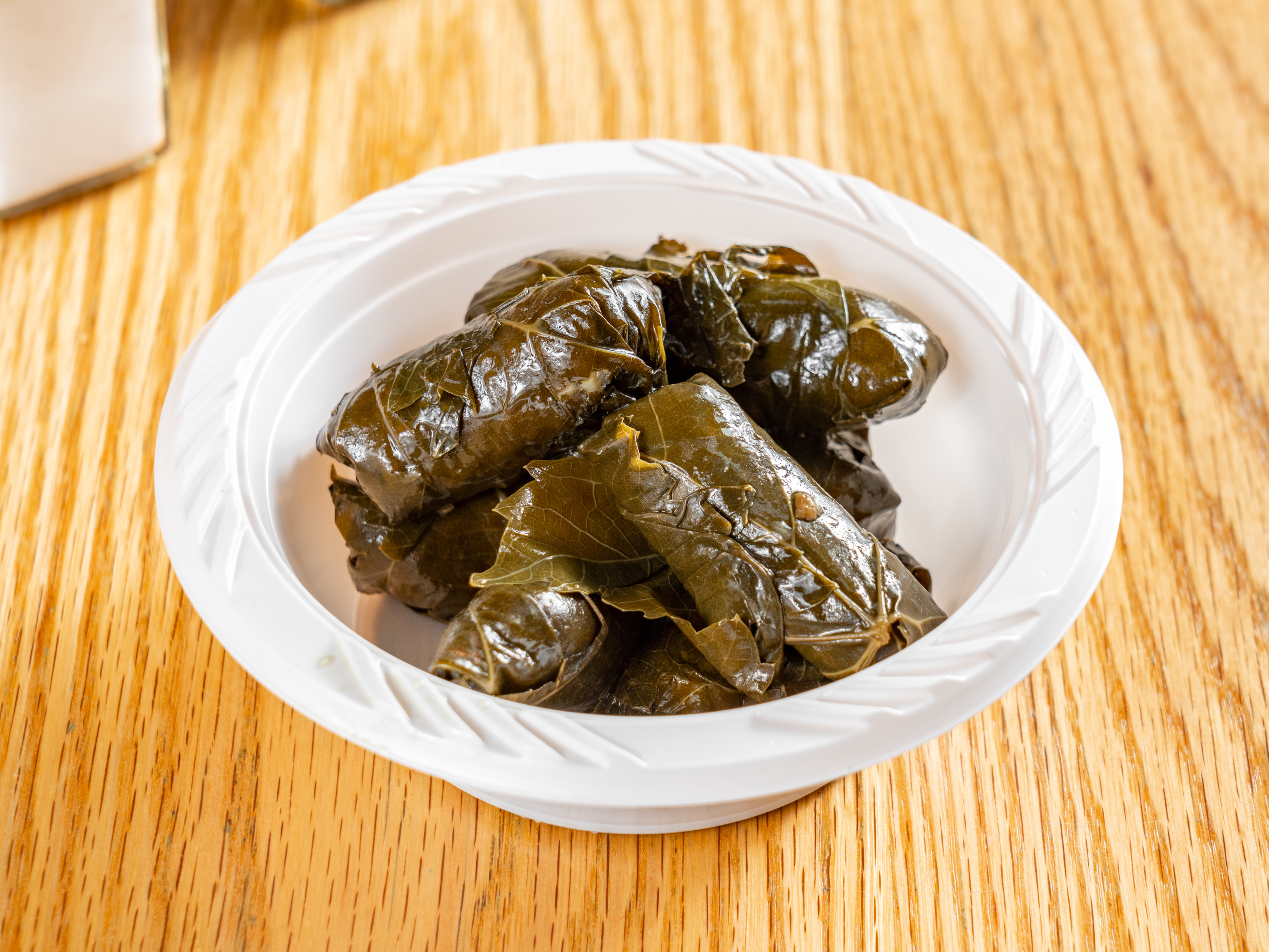 Order 8 Piece Grape Leaves food online from The Chicken Shack store, Rego Park on bringmethat.com