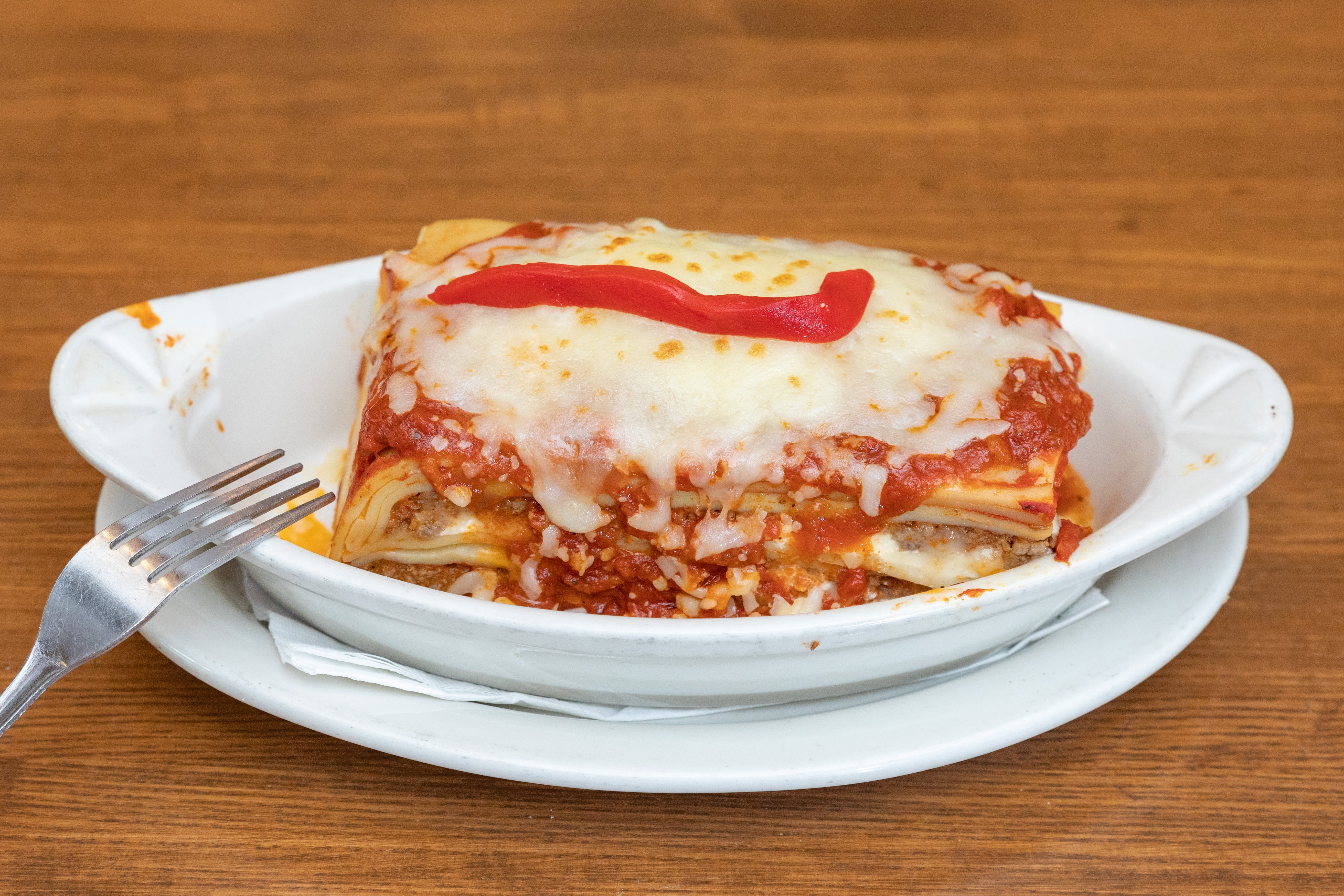 Order Lasagna - Entree food online from Pizza Palace store, Fairfield on bringmethat.com