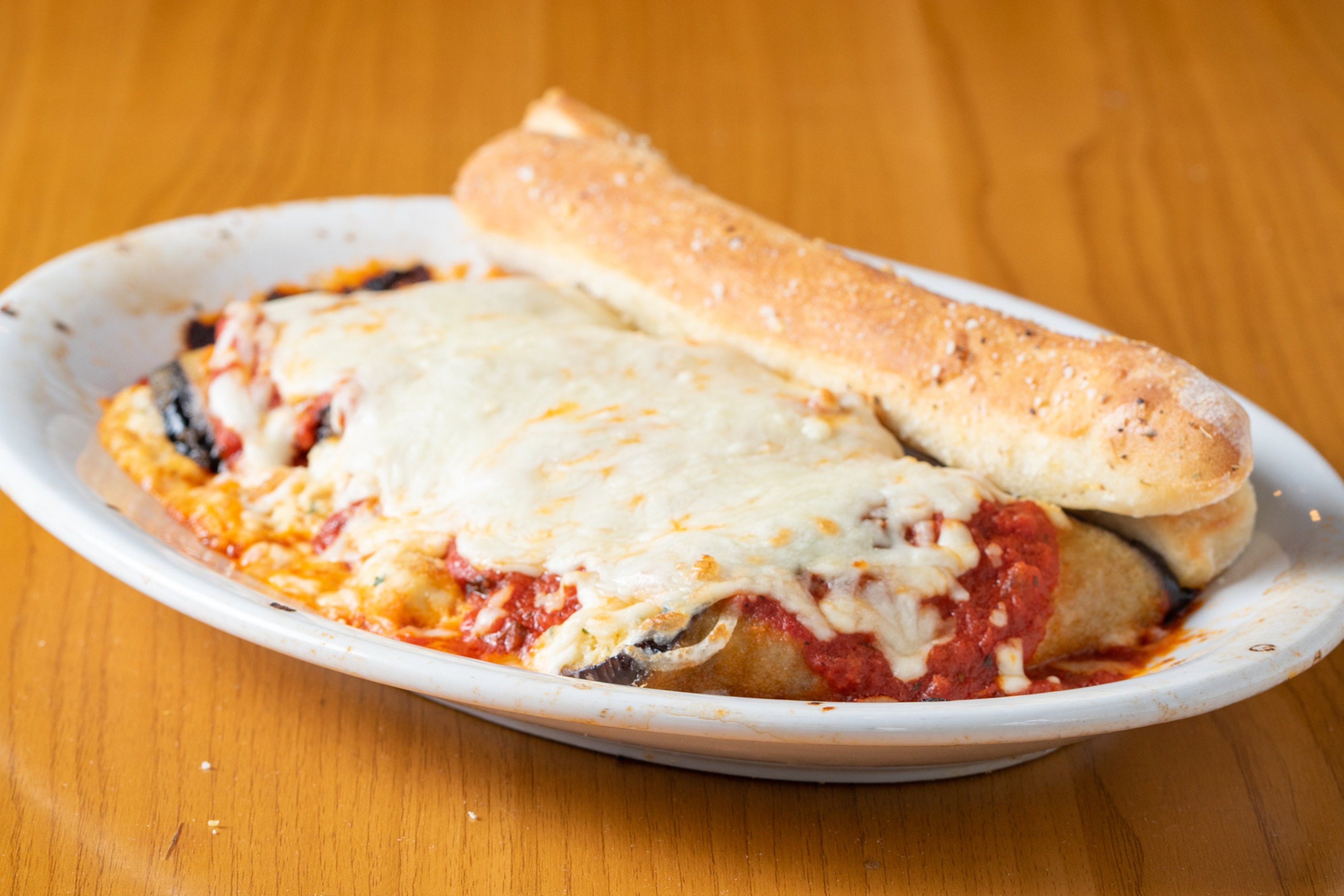 Order Lasagna food online from Amante Gourmet Pizza store, Chapel Hill on bringmethat.com
