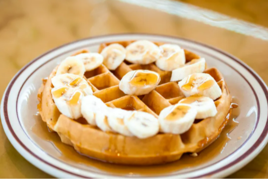 Order Banana Caramel Waffle  food online from Golden Bear Pancake & Crepery Restaurant store, Lansing on bringmethat.com