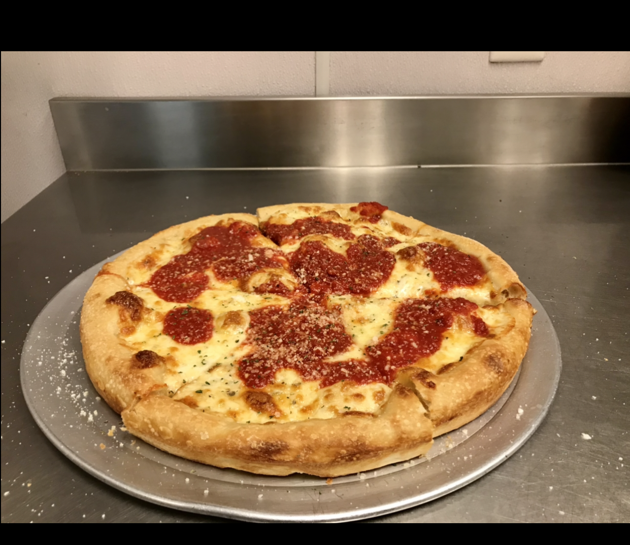 Order 14" Chicago Round Pizza food online from Johnny's Pizza store, Cary on bringmethat.com