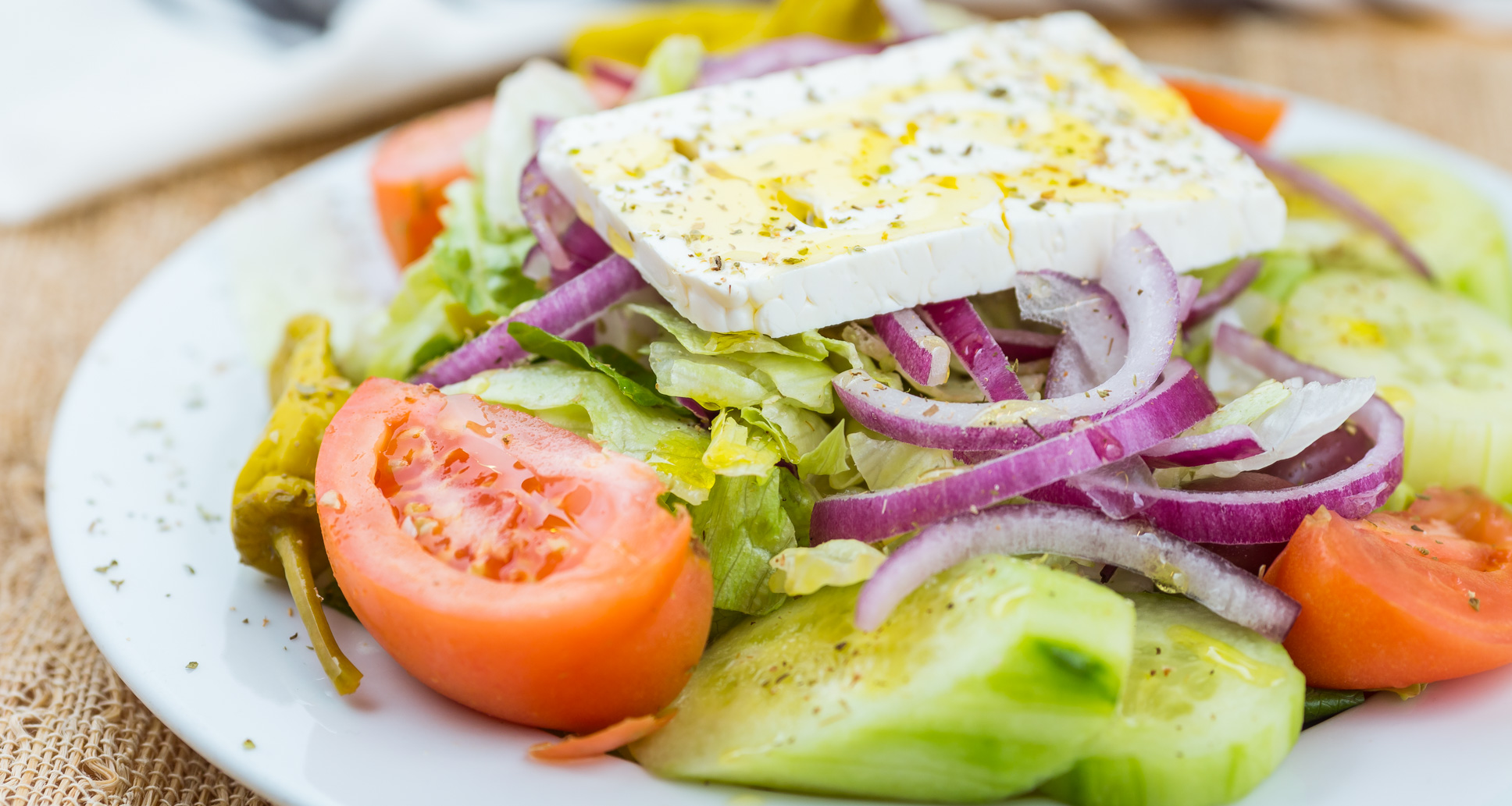 Order Greek Salad food online from Haystack Pizza Restaurant-Pick-Up & Delivery store, San Francisco on bringmethat.com