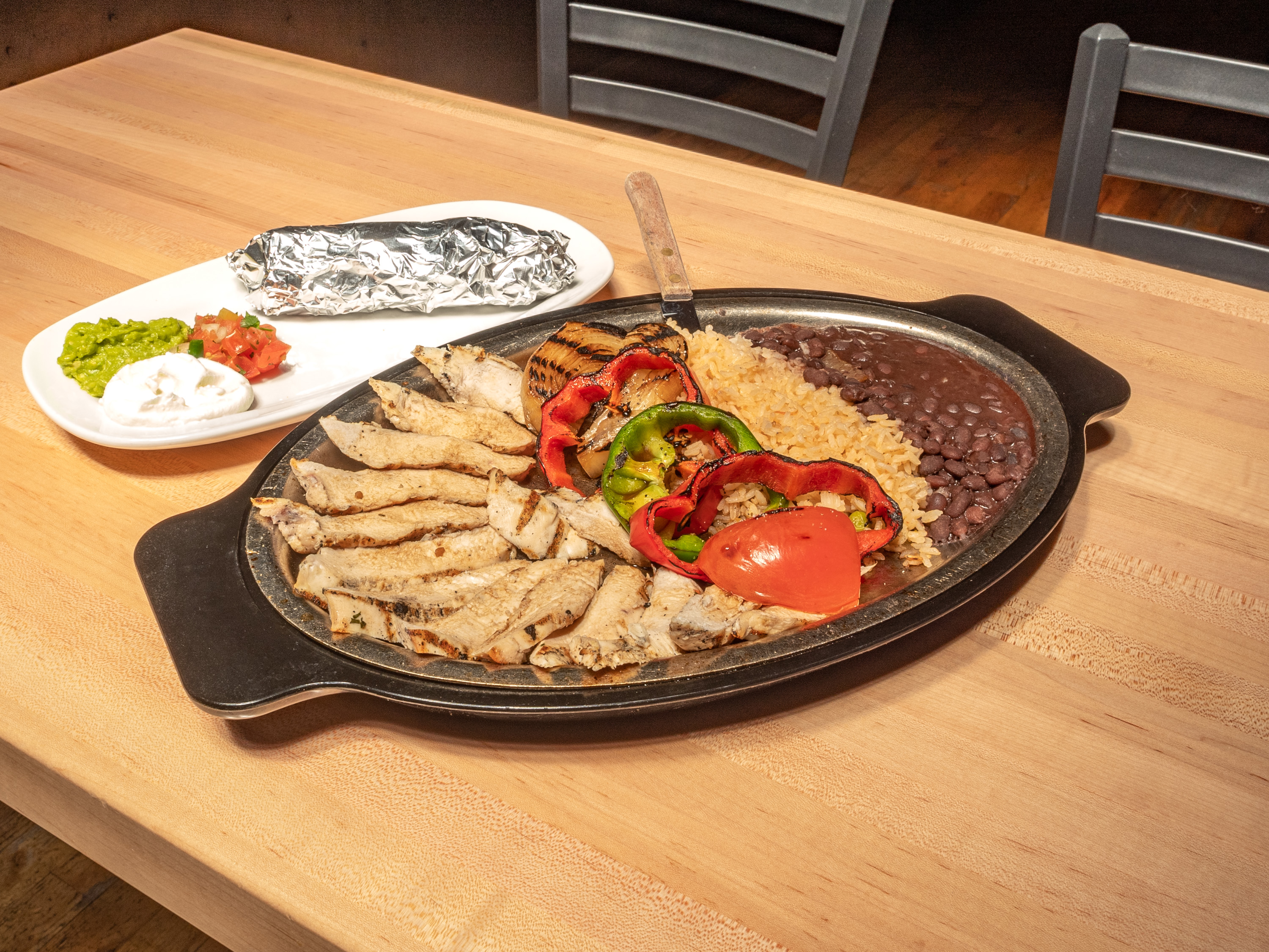 Order Grilled Chicken Fajitas food online from The Rio Grande Mexican Restaurant store, Lone Tree on bringmethat.com