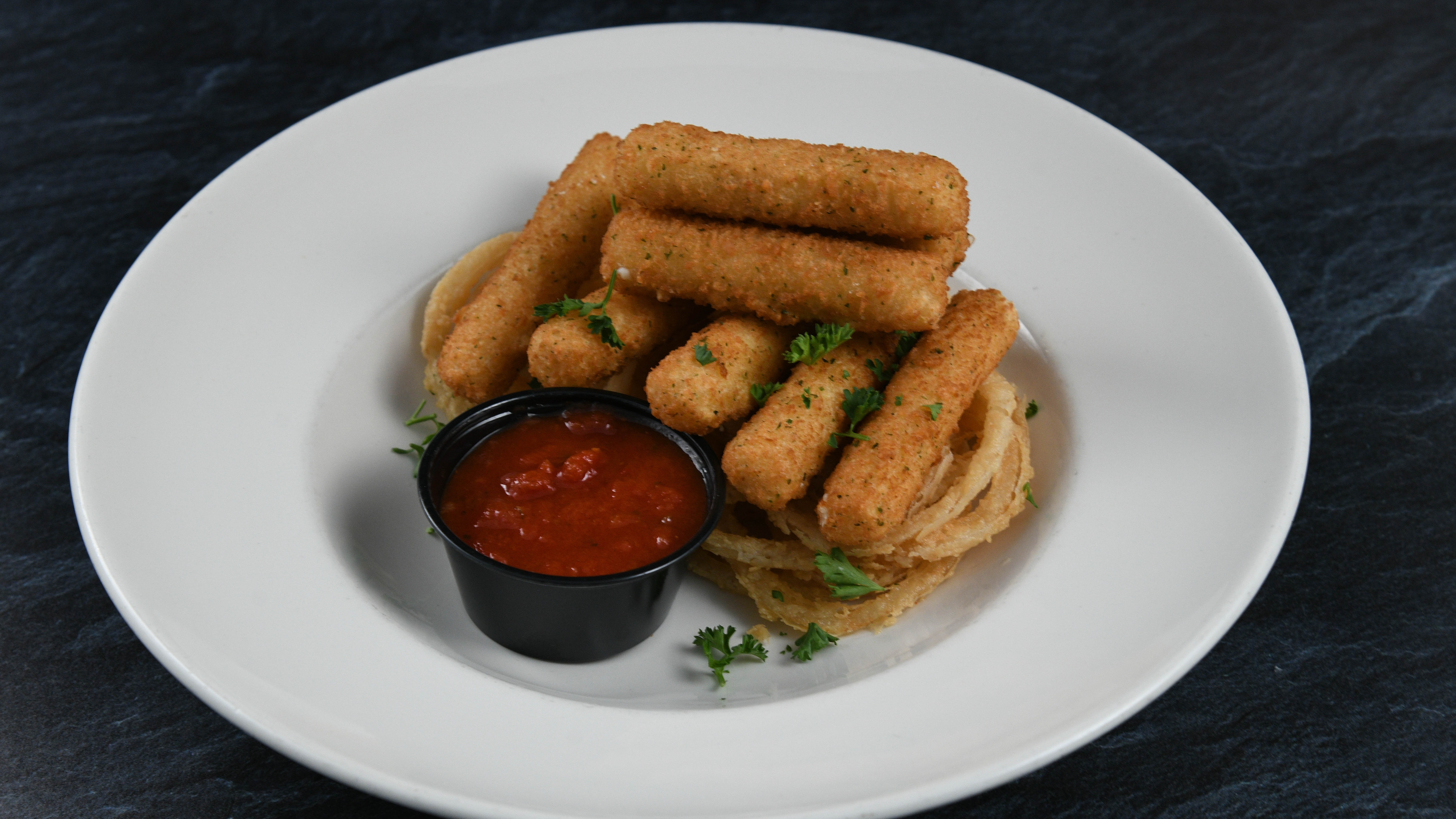 Order Cheese Sticks* food online from Rainforest Cafe store, Tempe on bringmethat.com
