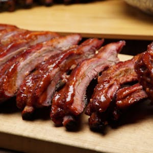 Order 1/2 Rack of Ribs food online from Big Smoke Barbecue store, Hays on bringmethat.com