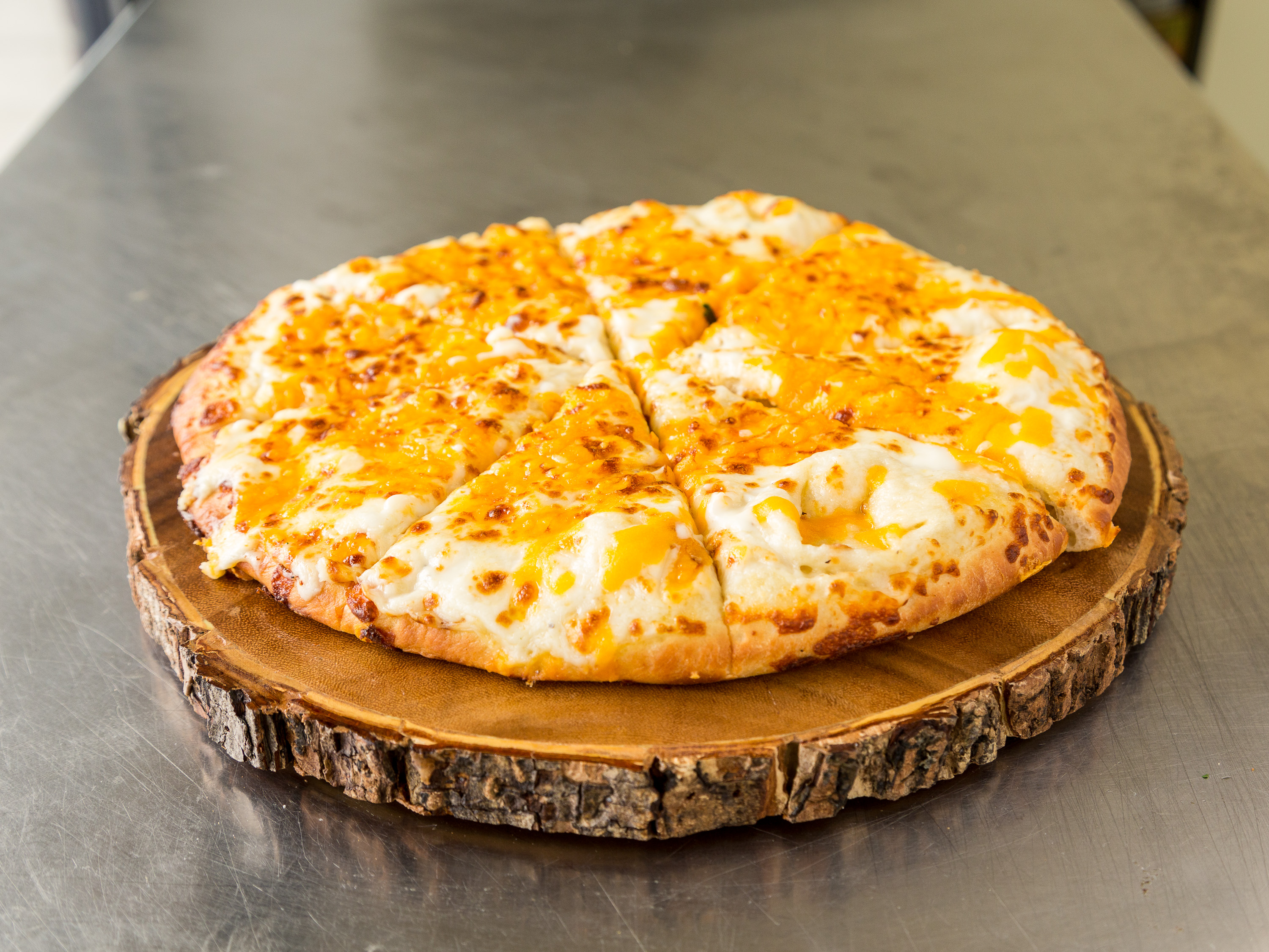 Order 4 Cheese Revolution Pizza food online from Revolution Pizza store, Willowick on bringmethat.com