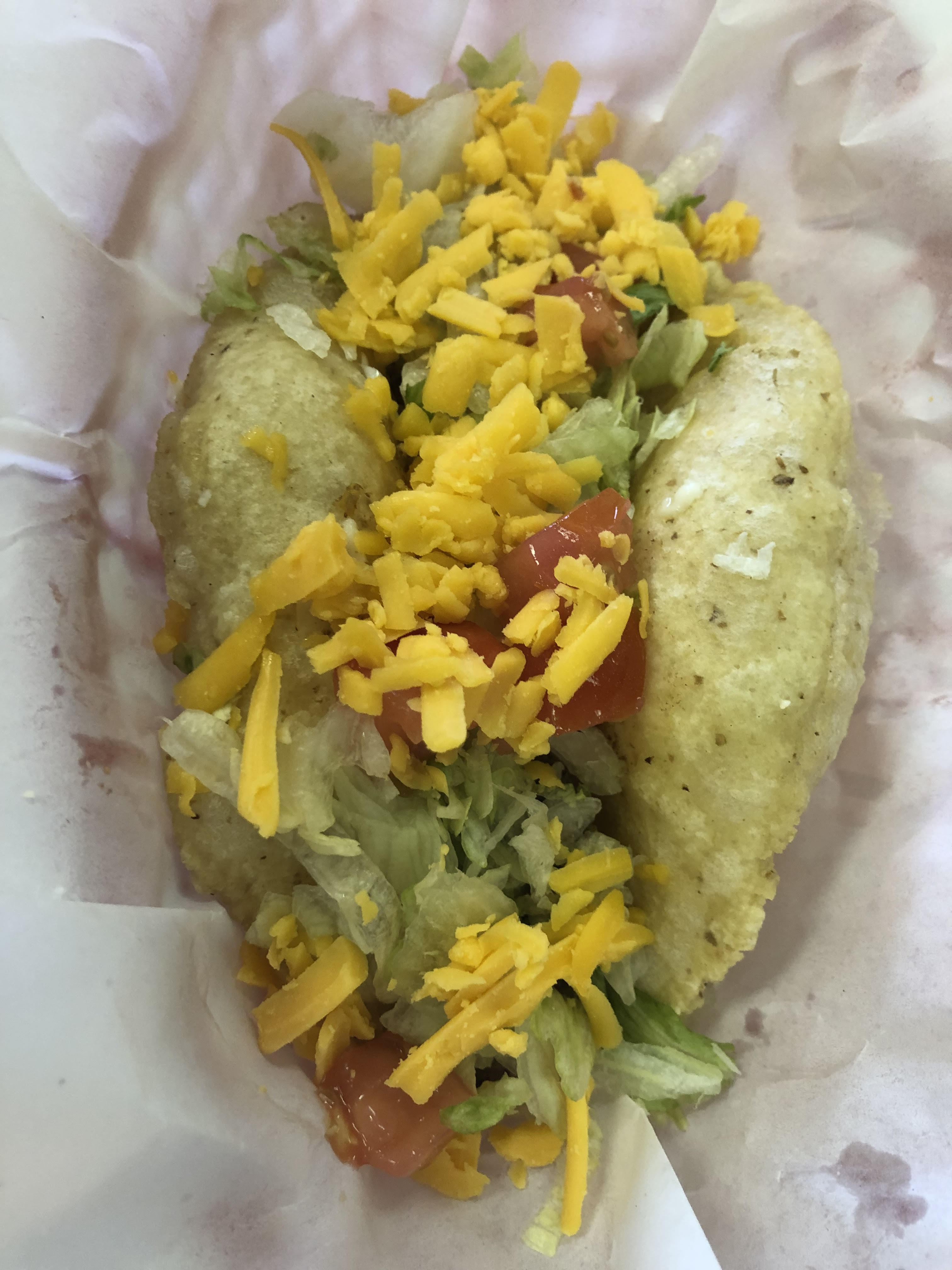 Order Puffy Taco food online from Trini Mexican Carry Out store, New Baltimore on bringmethat.com