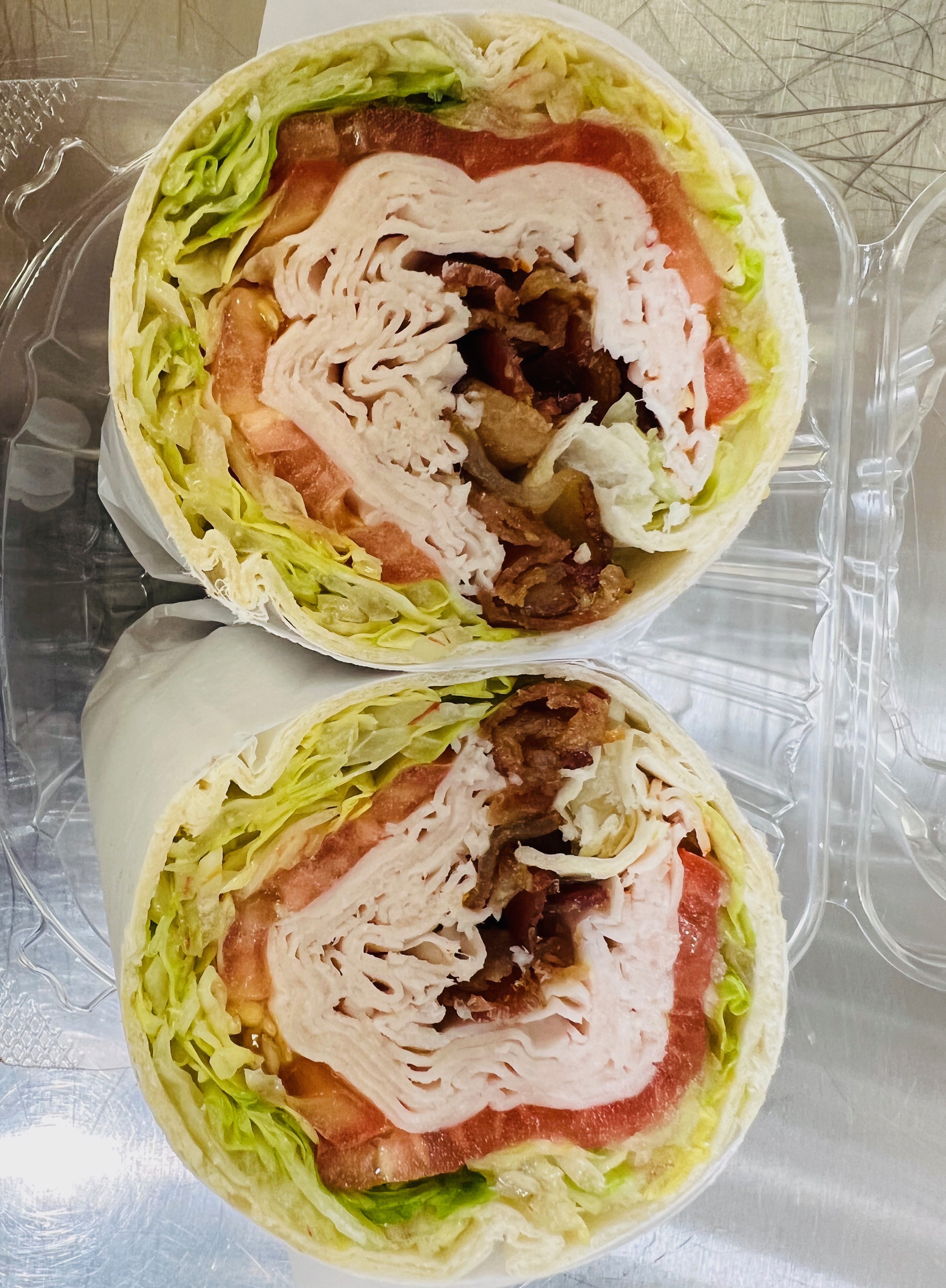 Order Turkey BLT Wrap food online from New Z Deli & Grill store, Freeport on bringmethat.com