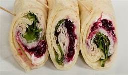 Order (16) Turkey Cranberry Brie Wrap food online from Citra store, Chestnuthill on bringmethat.com