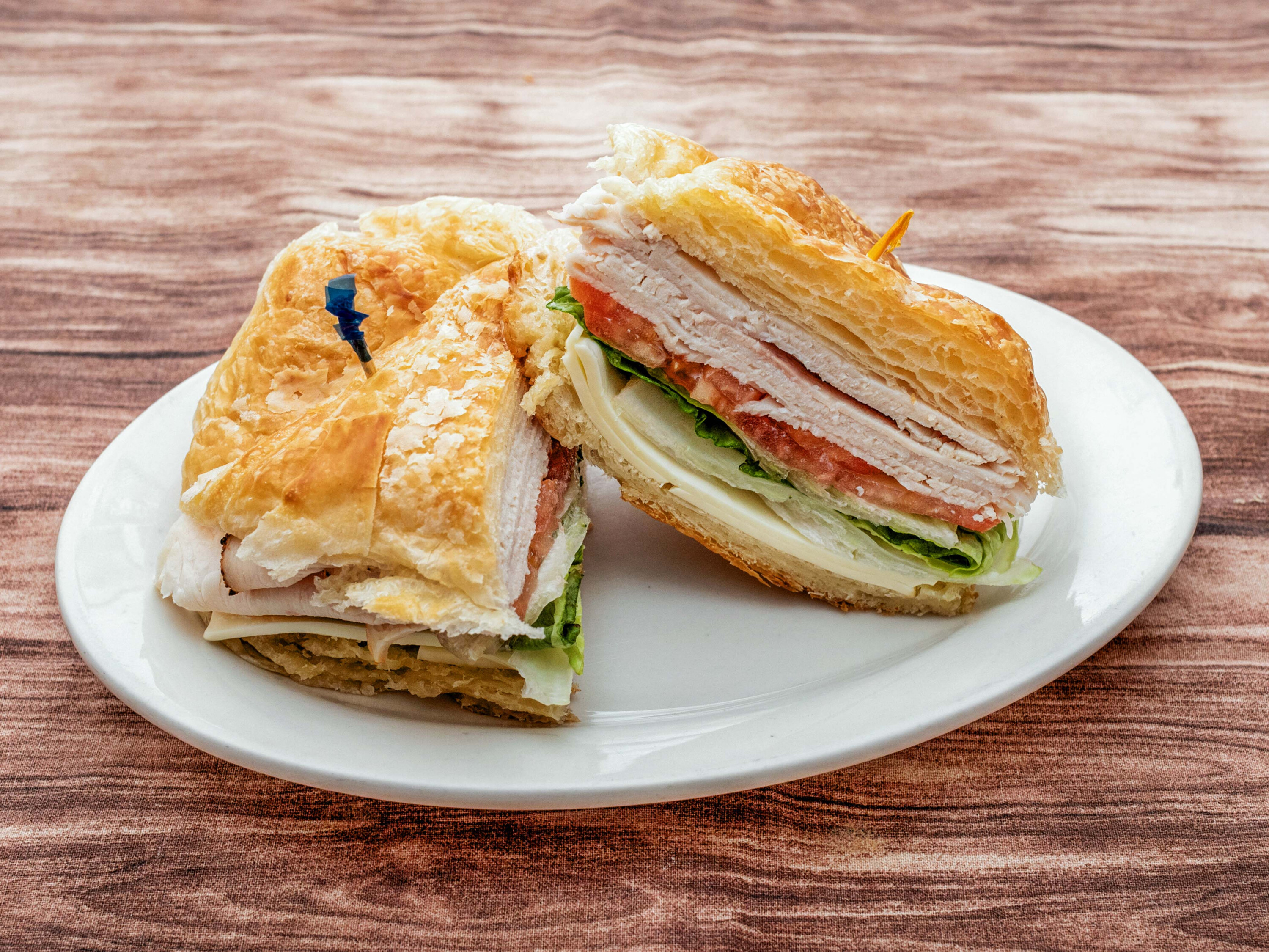 Order Turkey Club Sandwich food online from Westmont Bagels - Deli & Cafe store, Haddon Township on bringmethat.com