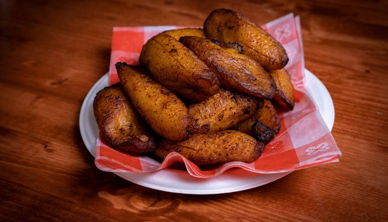 Order Fried sweet plantains/Platanos maduros food online from Quechua's Peruvian Rotisserie Chicken and Cuisine store, Camp Hill on bringmethat.com