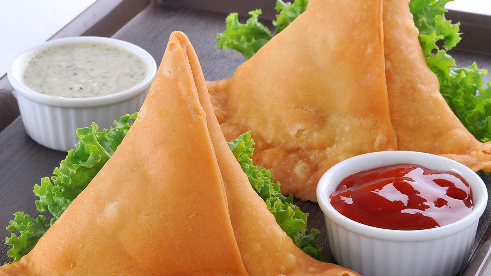Order Samosa 2pc food online from Cafe India store, Austin on bringmethat.com