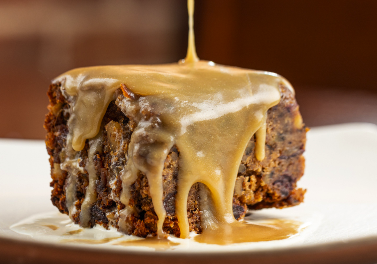 Order Sticky Toffee Puddin!  Date & Walnut Cake w/ Butterscotch food online from Branded Saloon Catering store, Brooklyn on bringmethat.com