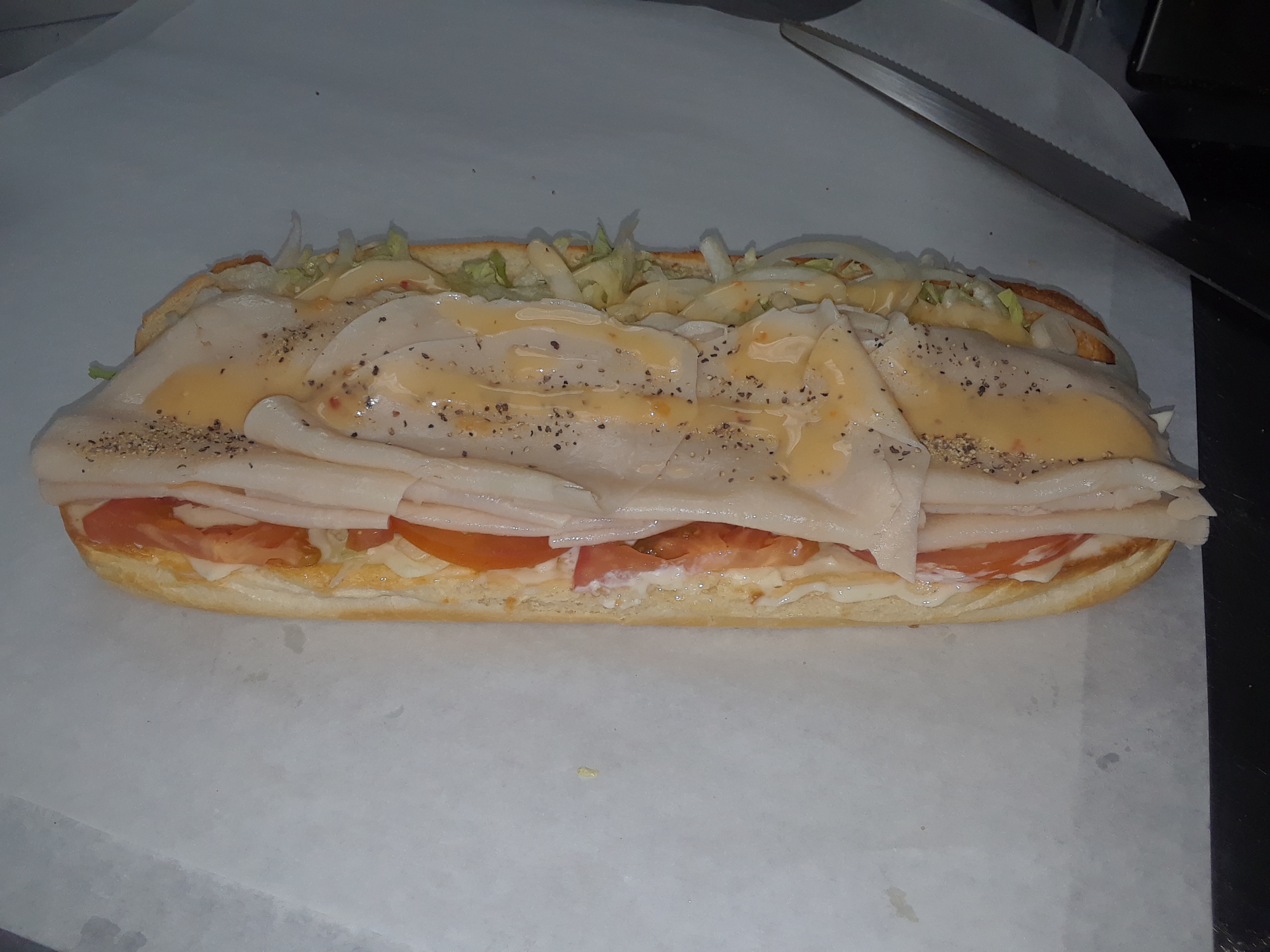 Order Turkey Sub food online from Mike's Steakhouse store, Buffalo on bringmethat.com