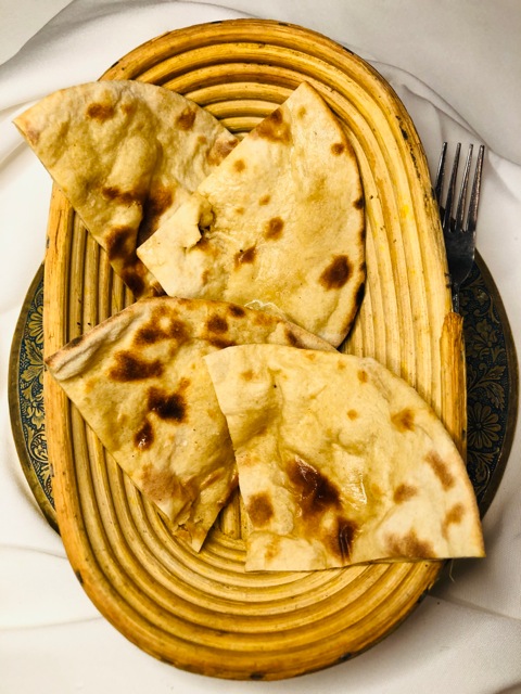 Order Tandoori Roti food online from New Delhi Restaurant store, San Francisco on bringmethat.com