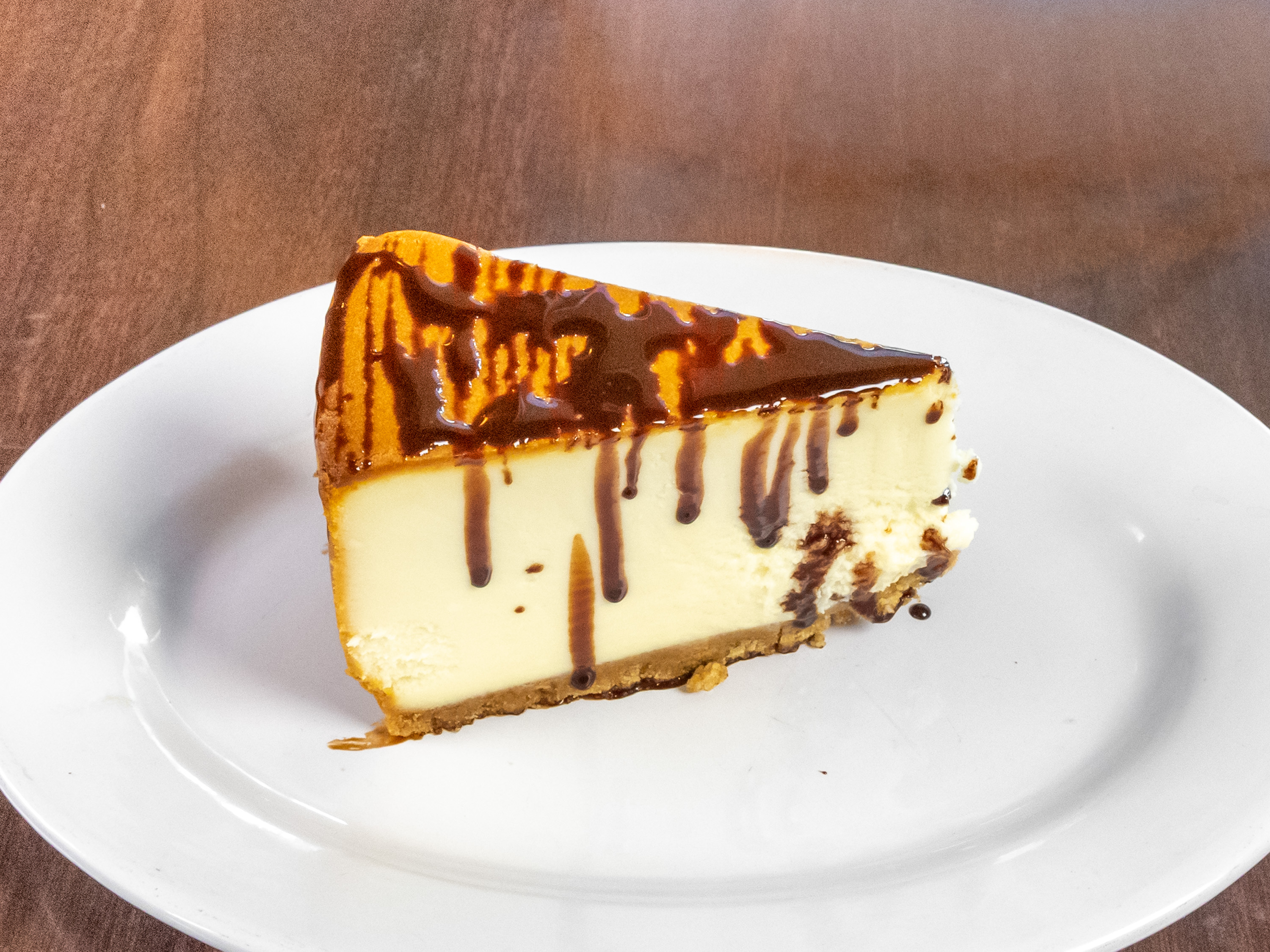 Order Slice of Cheesecake food online from Sal Gilbert Pizza store, Gilbert on bringmethat.com