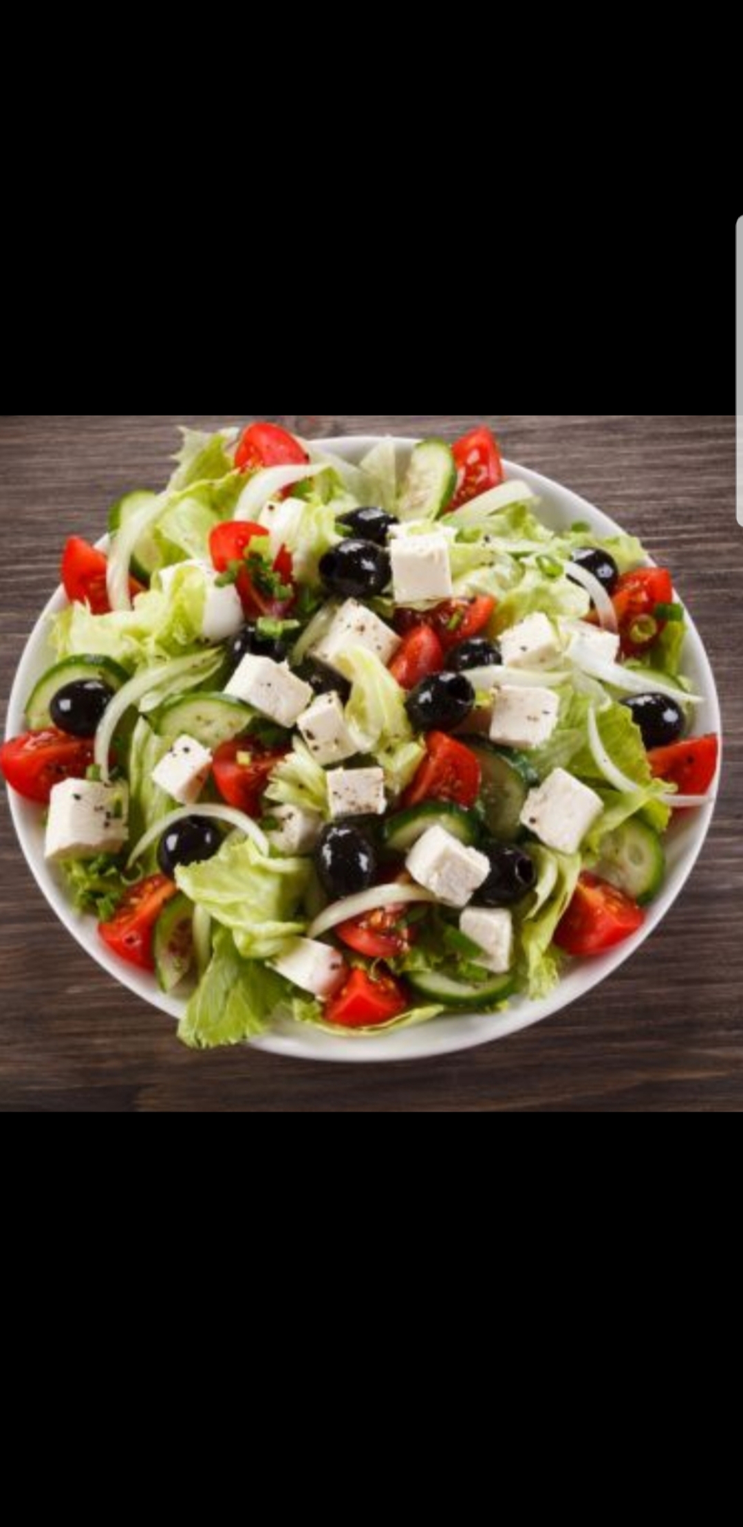 Order Greek Salad food online from Romeo's Pizza and Pasta store, Wadsworth on bringmethat.com