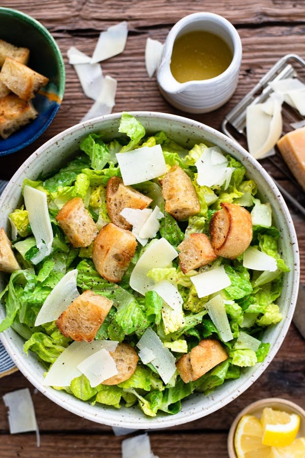 Order Caesar Salad - Salads food online from Bells Pizza Company store, Bellflower on bringmethat.com