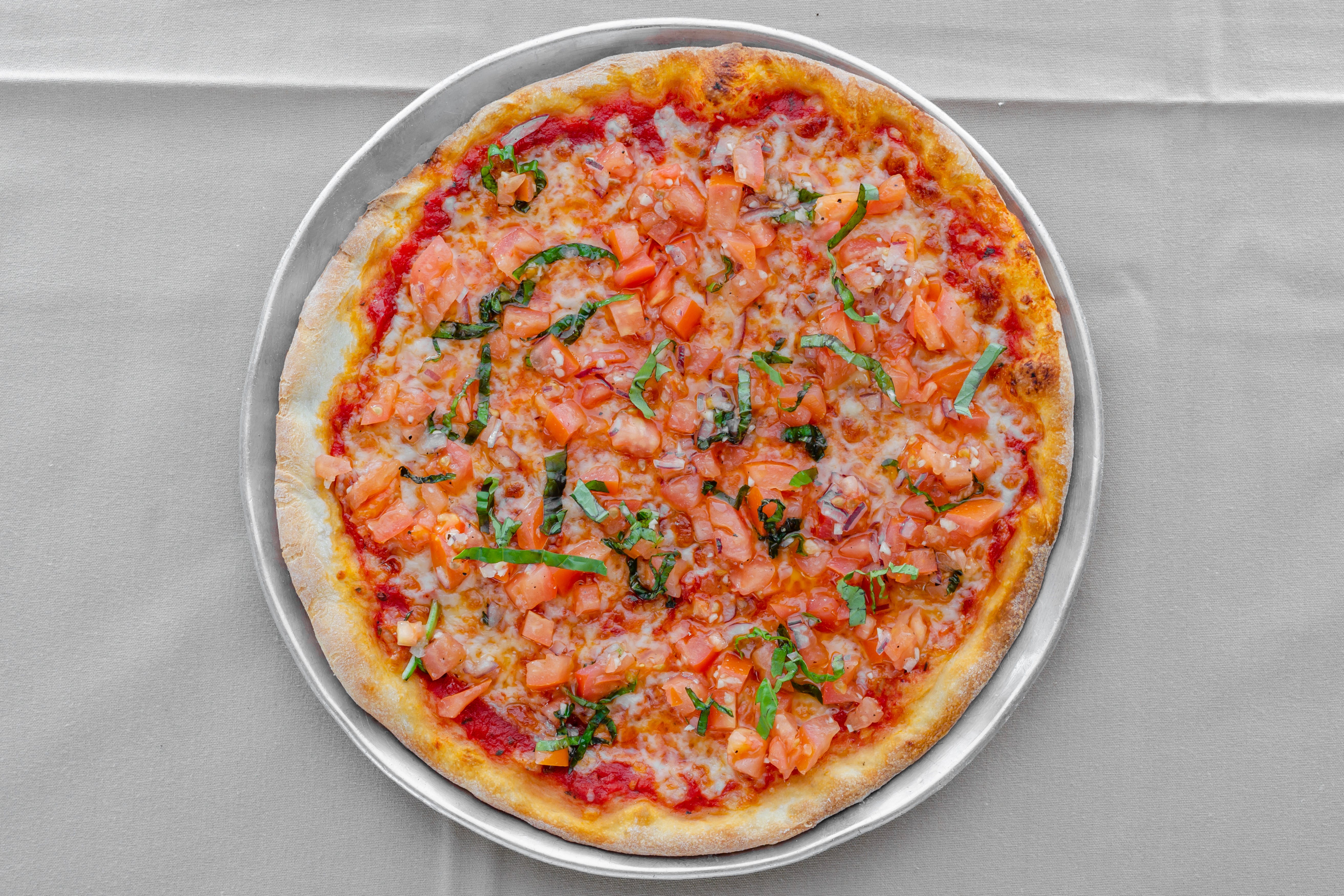 Order Bruschetta Pizza - Medium food online from La Scarpetta Italian Restaurant store, West Long Branch on bringmethat.com