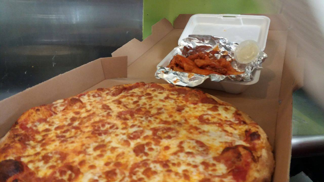 Order 1 Medium Pizza with 8 Wings food online from House Of Burrito Chicken & Pizza store, Waldwick on bringmethat.com