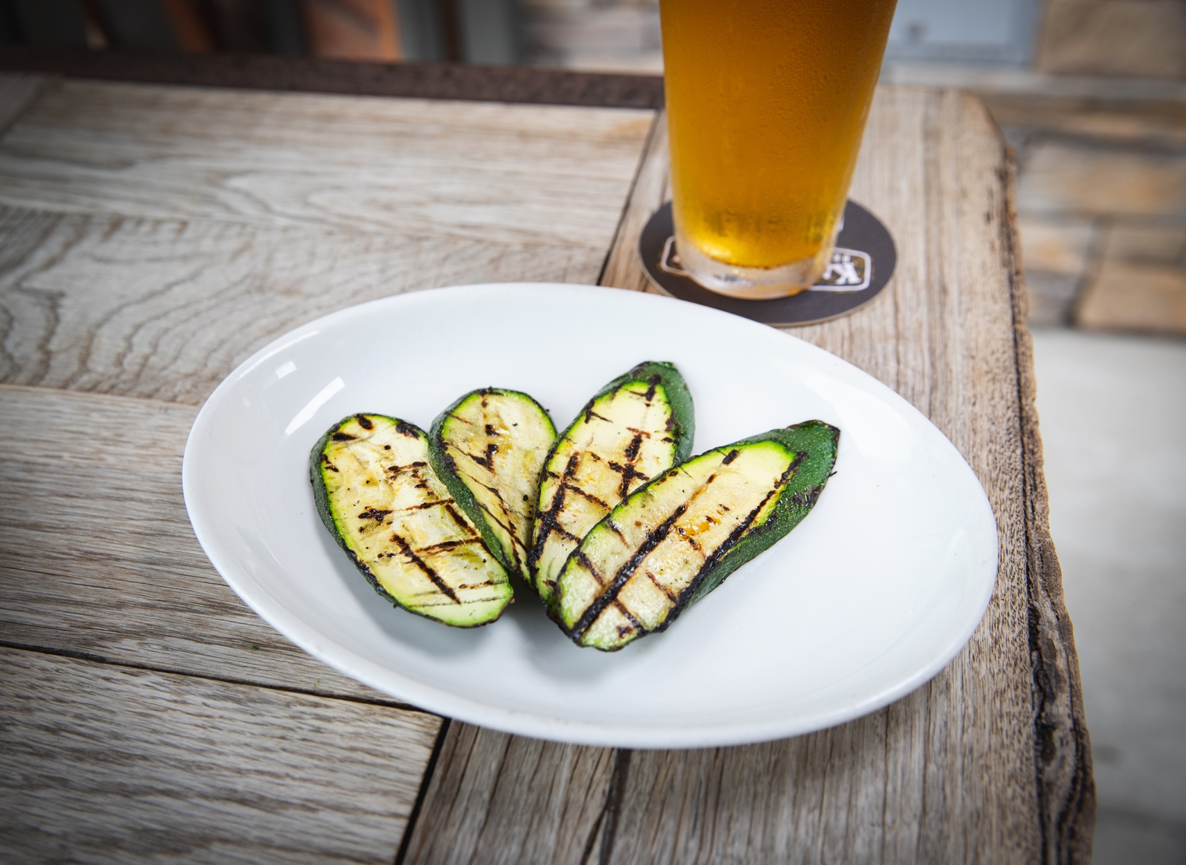 Order Grilled Zucchini food online from Karl Strauss Brewing Company store, Costa Mesa on bringmethat.com