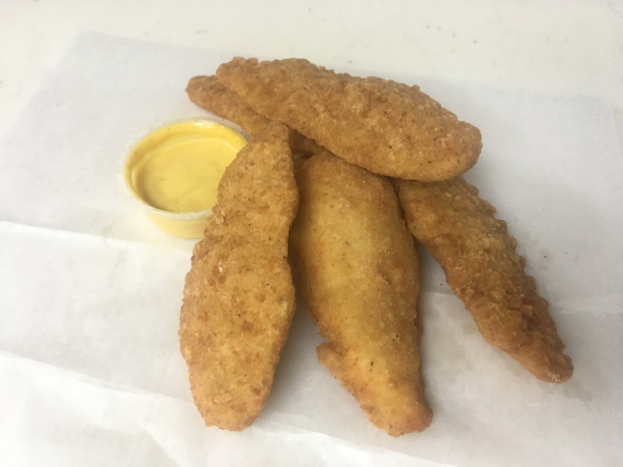 Order 4 Chicken Tenders food online from Katsouprinis Pizza Squared store, Washington on bringmethat.com