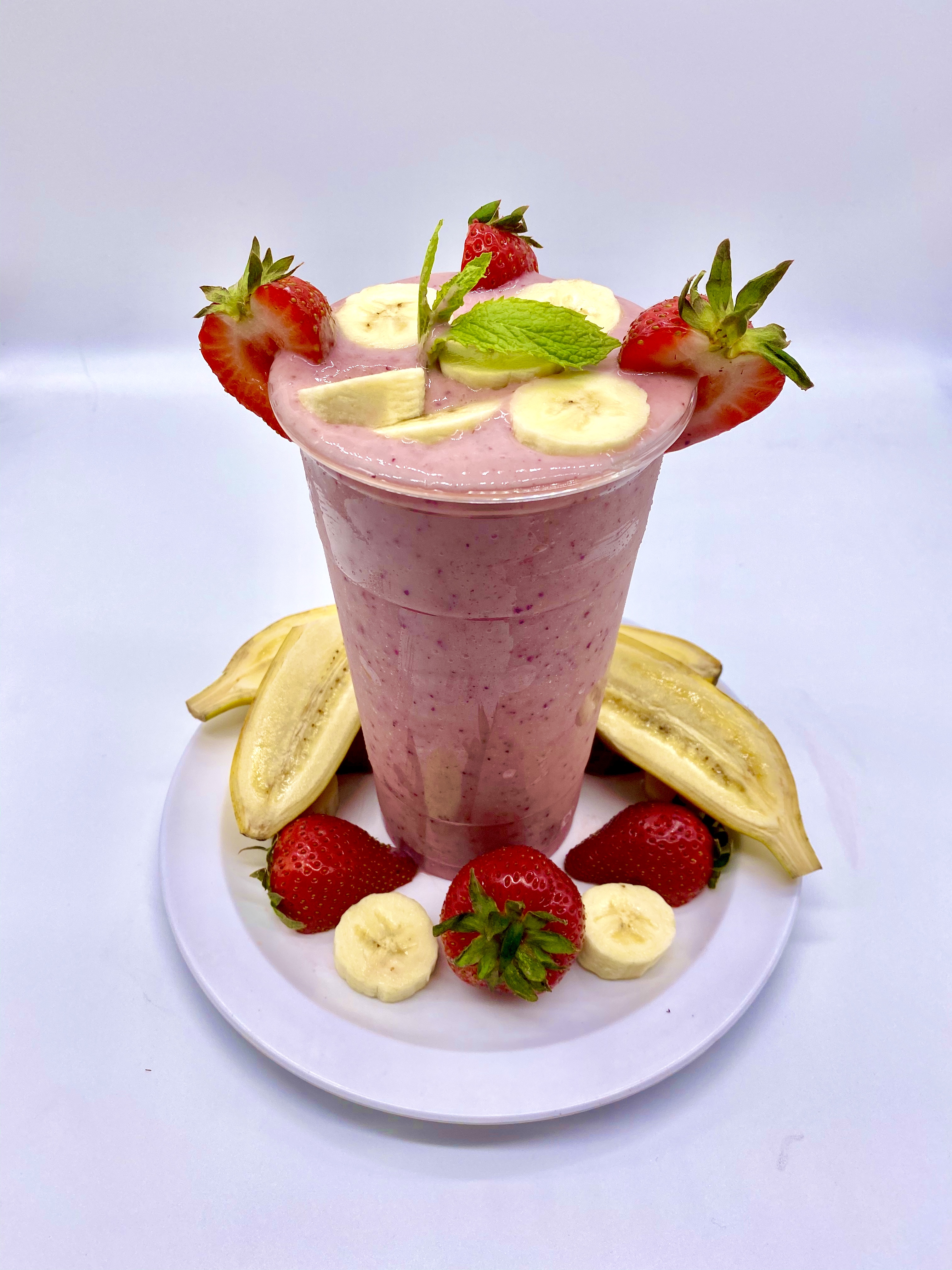 Order Yogurt strawberry banana smoothie  food online from Tacos Y Jugos Genesis store, Elmhurst on bringmethat.com