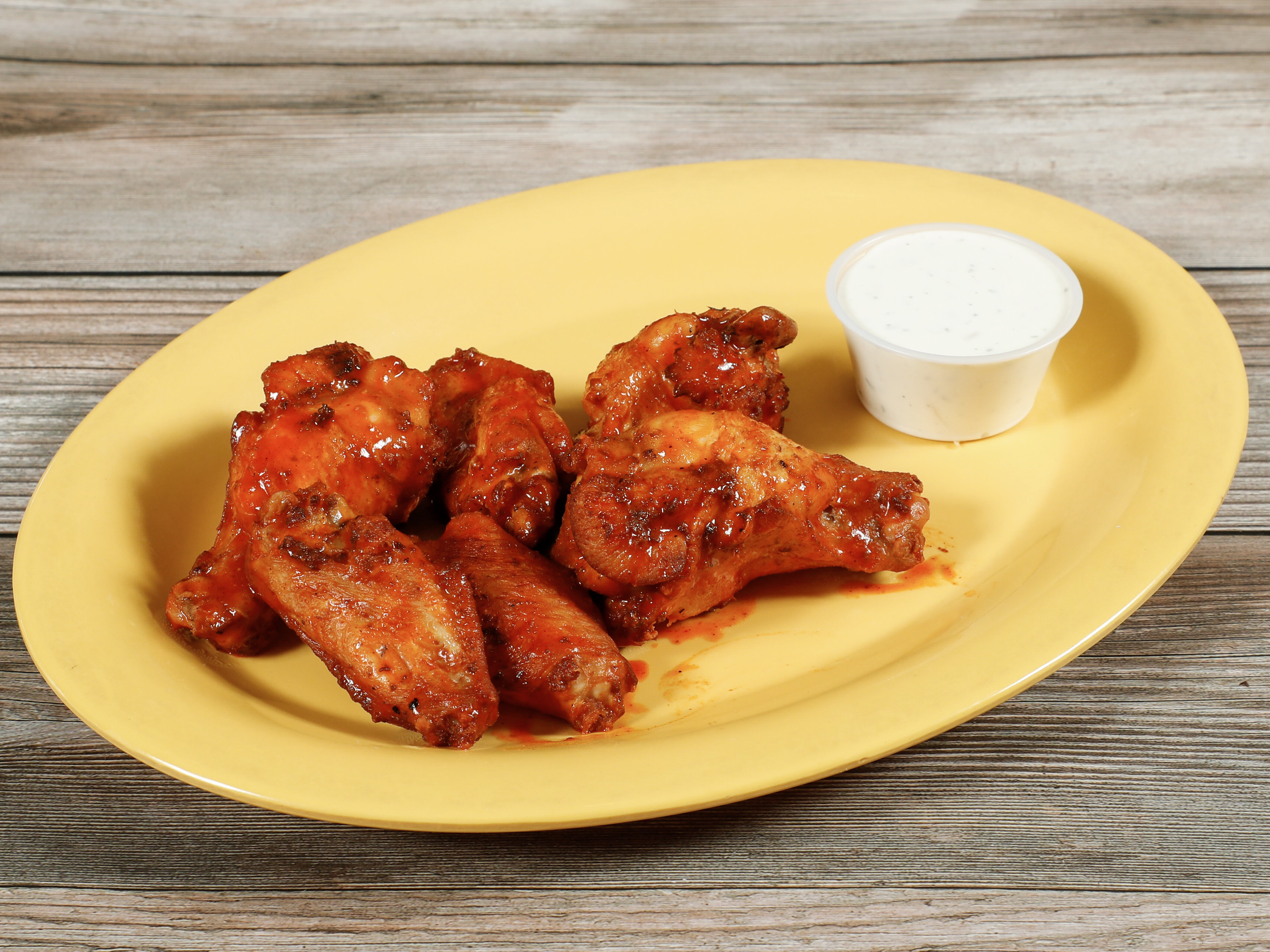 Order 12 Piece Regular Chicken Wings food online from Straw Hat Pizza store, Brentwood on bringmethat.com