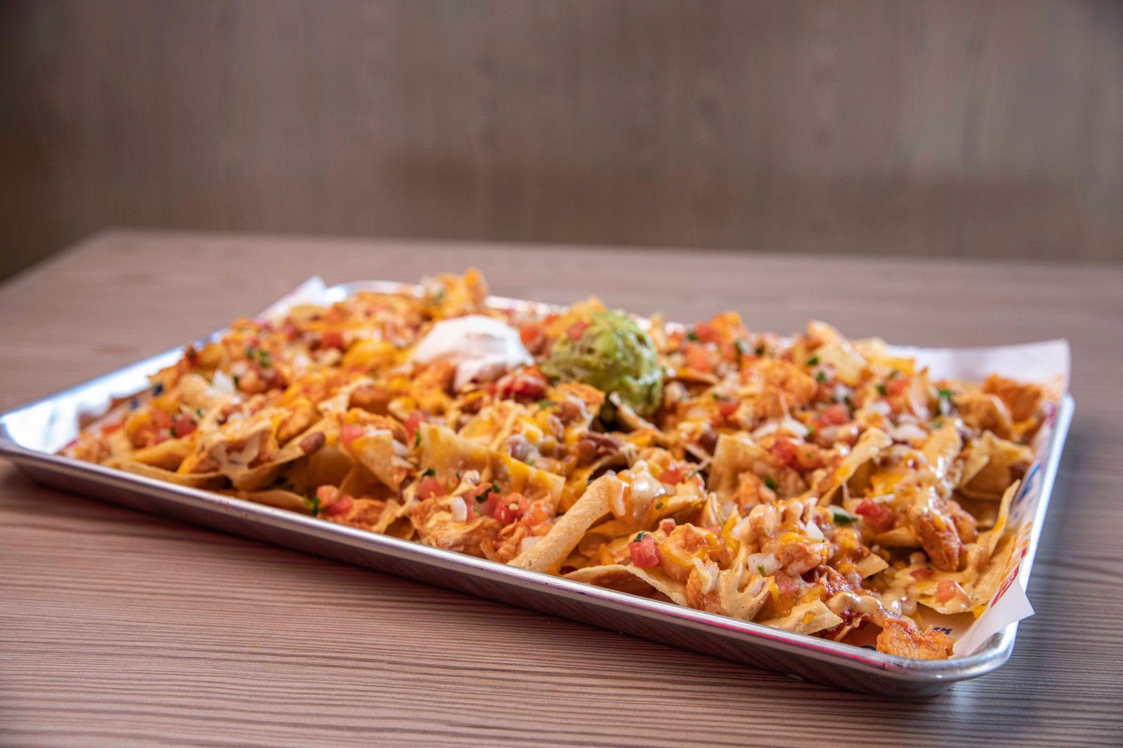 Order Sheet Pan Nachos food online from Ted Cafe Escondido store, Oklahoma City on bringmethat.com