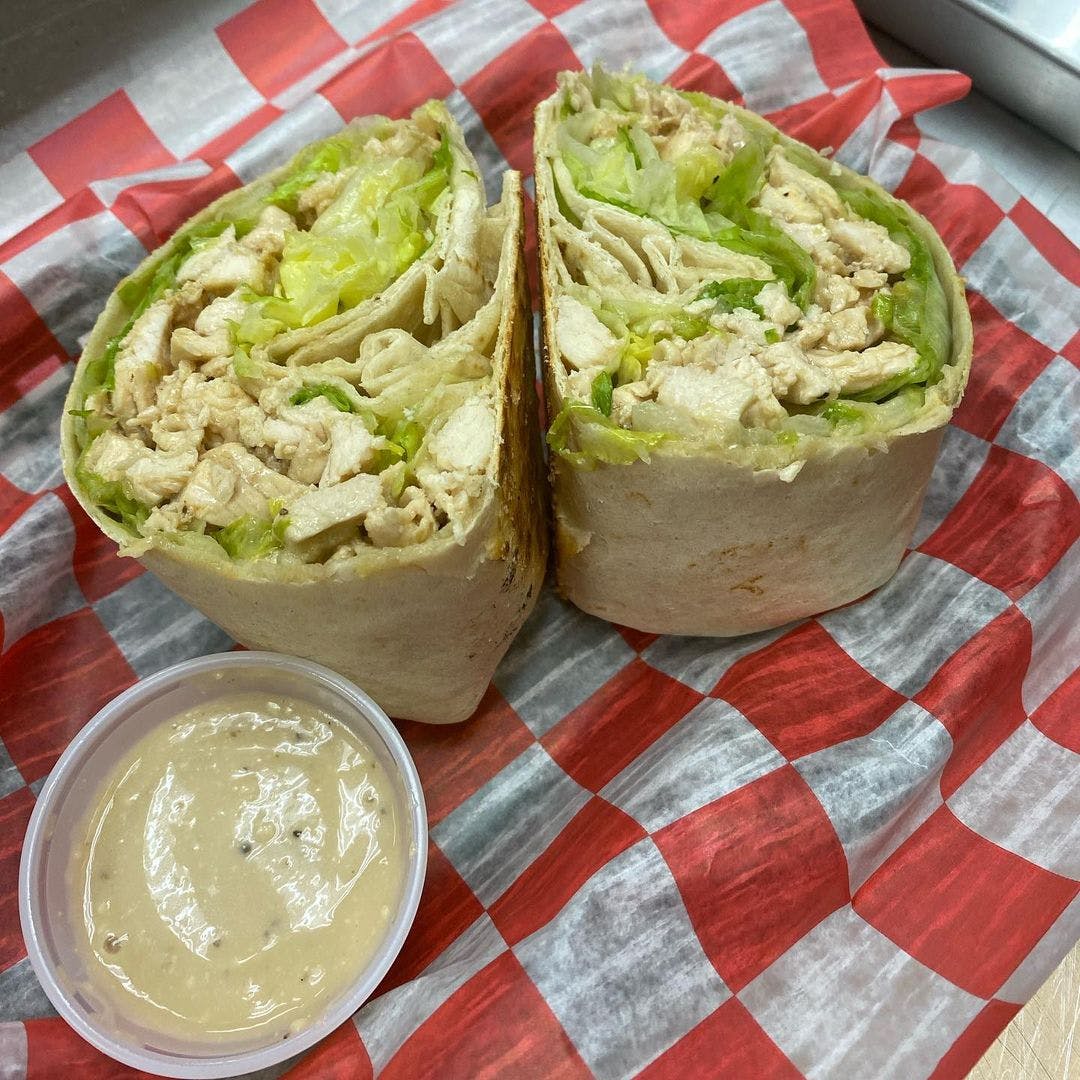 Order Chicken Caesar Wrap - Wrap food online from Brothers Pizza store, Burlington on bringmethat.com