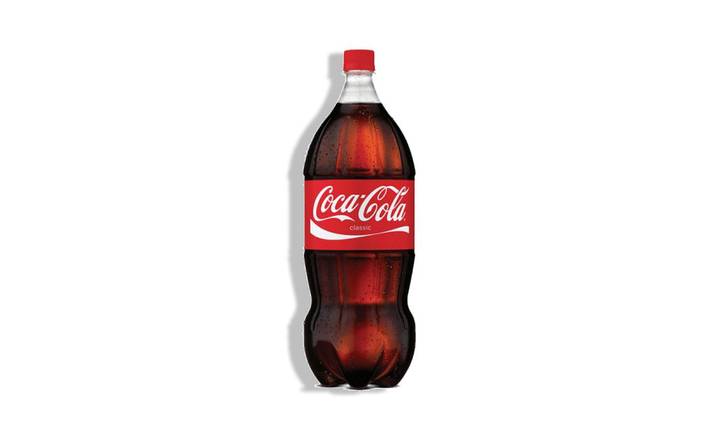Order Coke 2 Liter food online from The Lord Of The Wings store, San Francisco on bringmethat.com