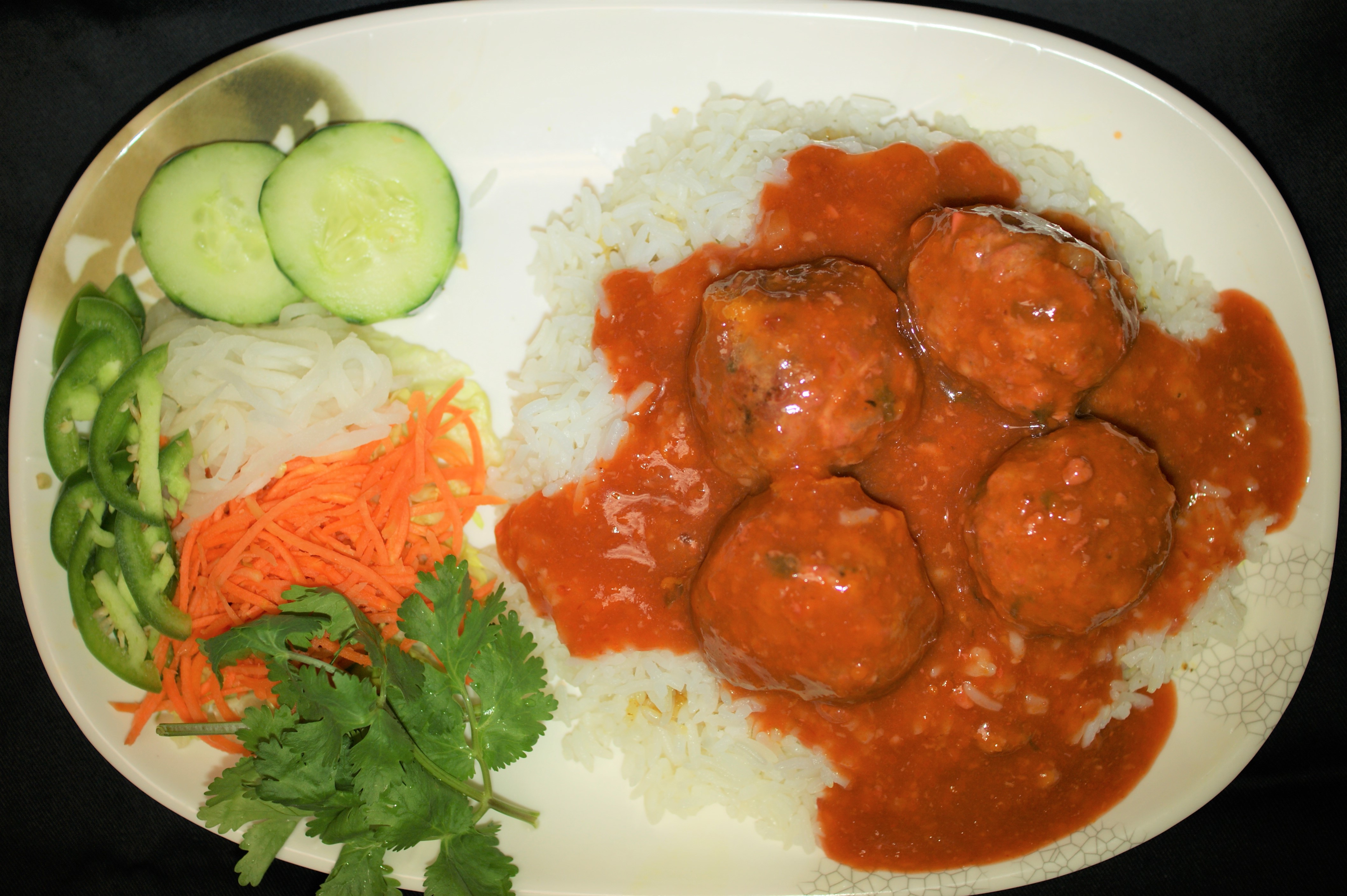 Order RP1. Vietnamese Pork Meatball in Tomato Sauce Rice Plate food online from Saigon Subs & Cafe store, Morristown on bringmethat.com