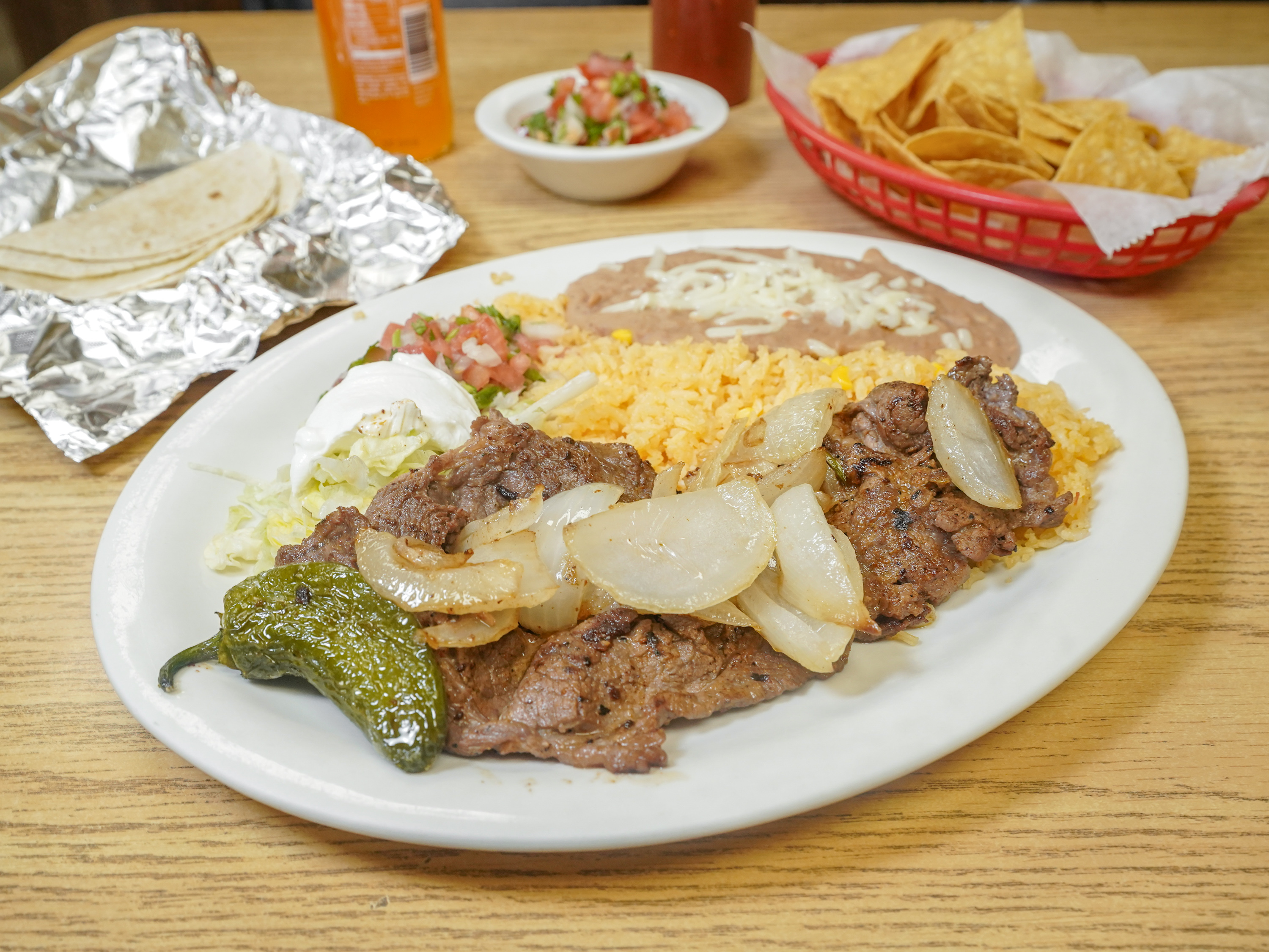 Order Nachos with Steak food online from La Casita Mexican store, Green Cove Springs on bringmethat.com