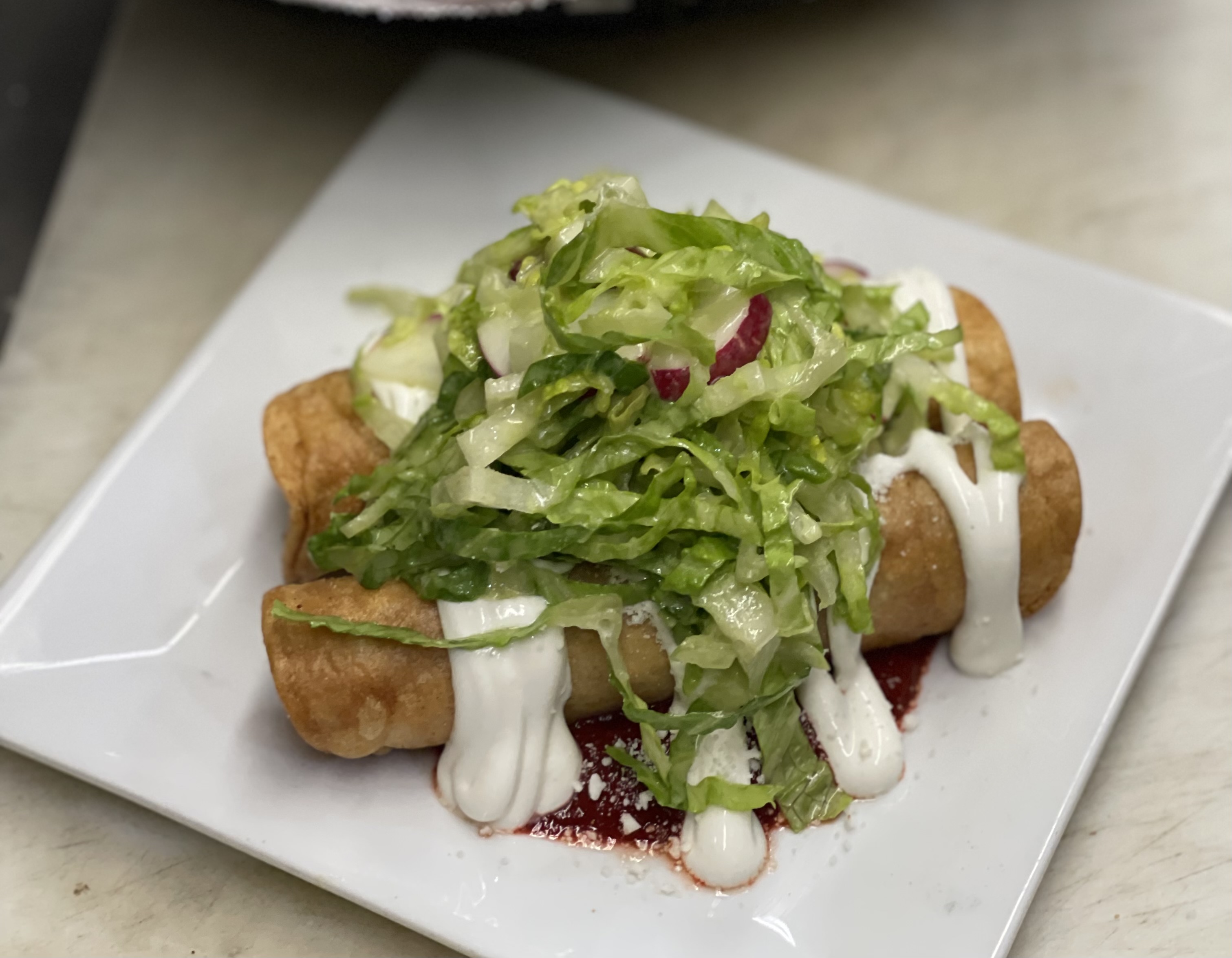 Order Crispy Taquitos  food online from Leslie's Kitchen store, Brooklyn on bringmethat.com