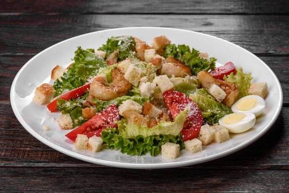 Order Caesar Salad food online from Michaelangelo's Pizza store, Baltimore on bringmethat.com