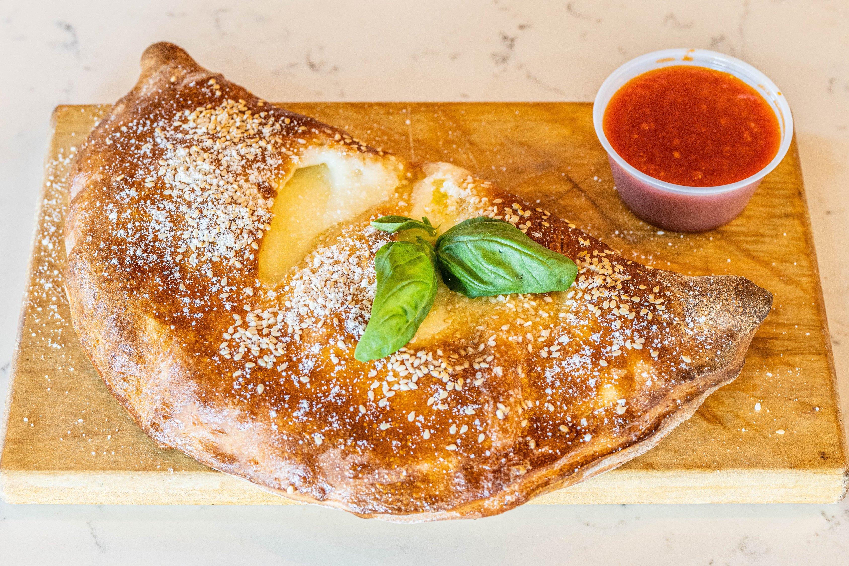 Order Cheese Calzone food online from Romans Pizza House store, Absecon on bringmethat.com
